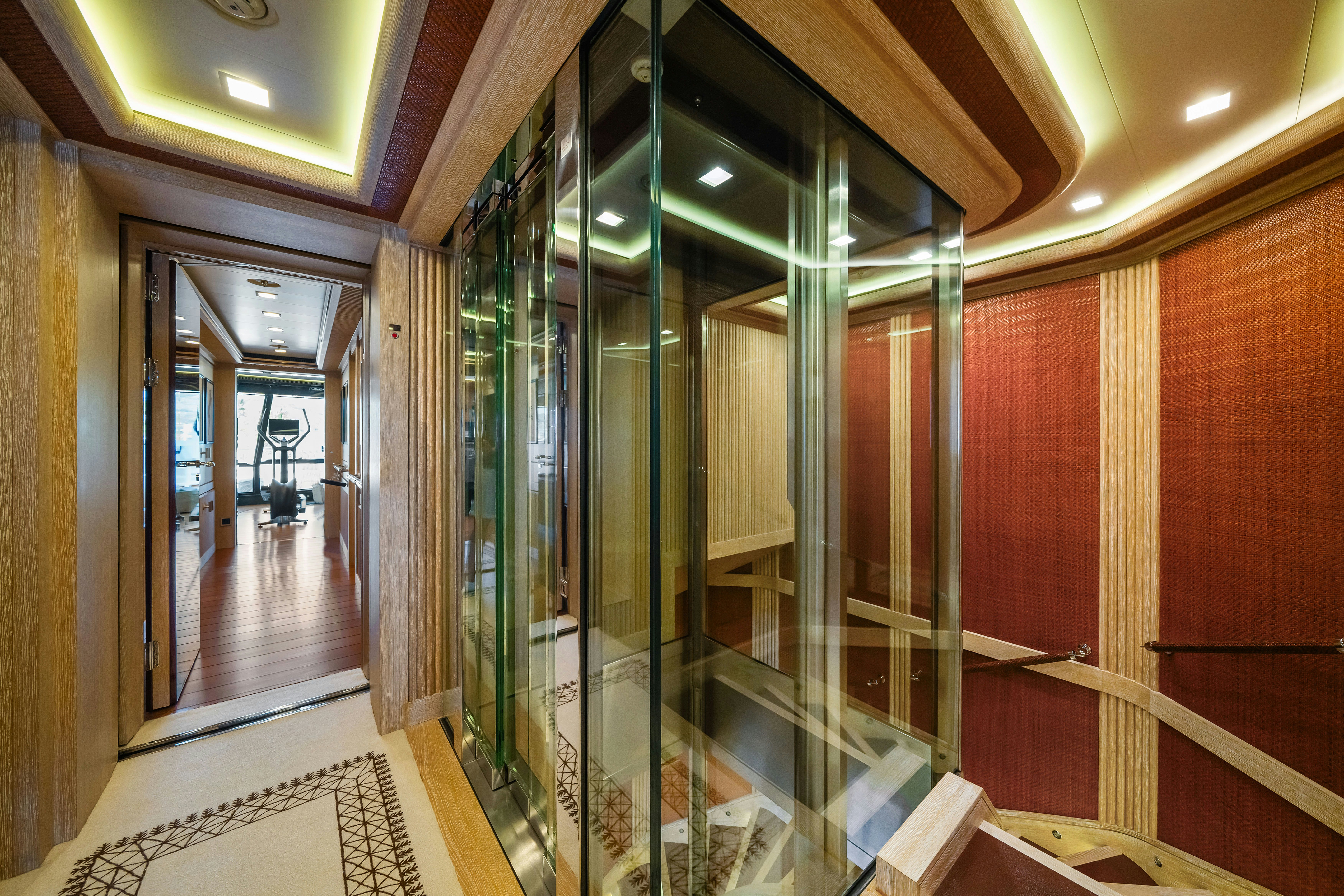 a room with glass walls aboard AXIOMA Yacht for Sale