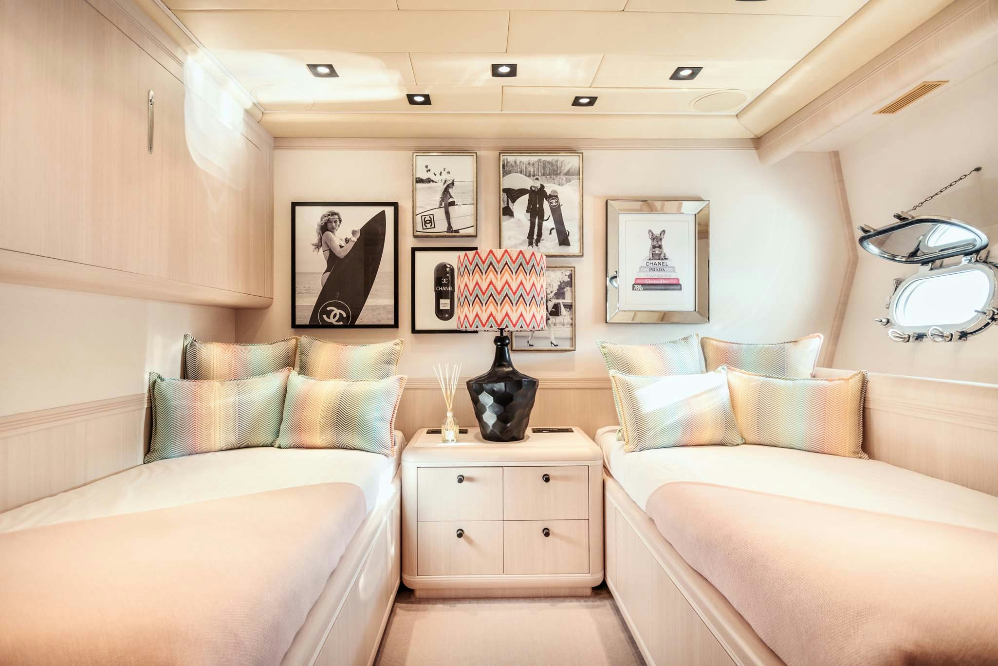 a room with a couch and a bed aboard MRS GREY Yacht for Charter