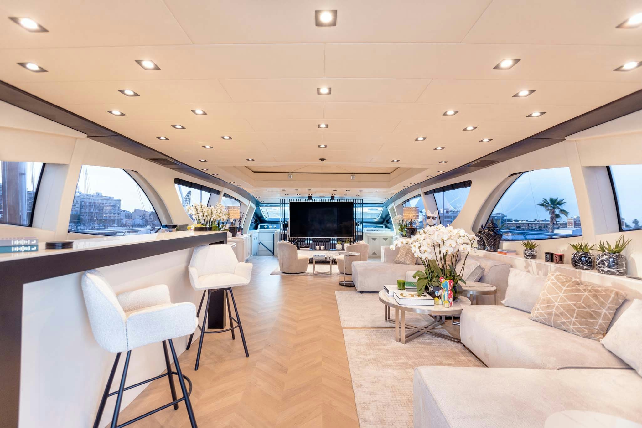 a living room with a fireplace aboard MRS GREY Yacht for Charter