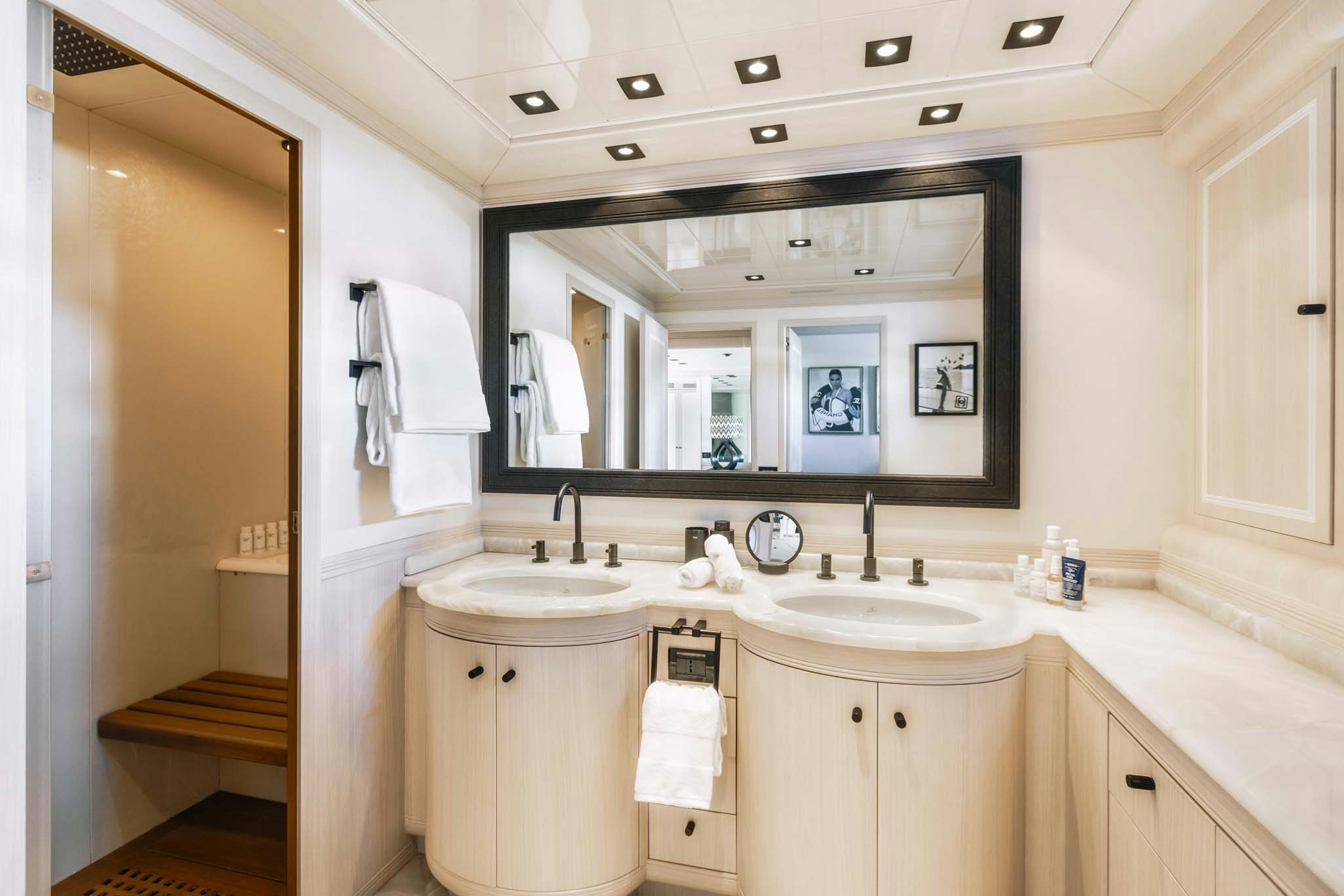 a bathroom with a large mirror aboard MRS GREY Yacht for Charter