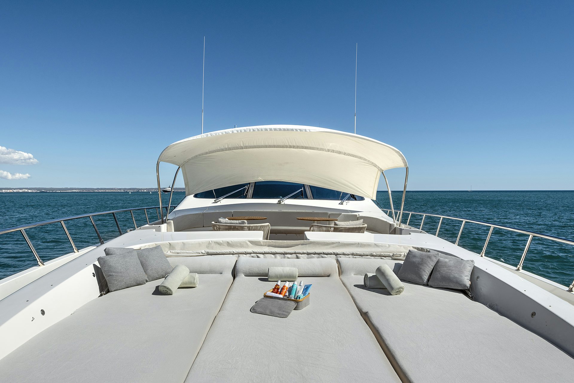 a boat on a deck aboard MRS GREY Yacht for Charter
