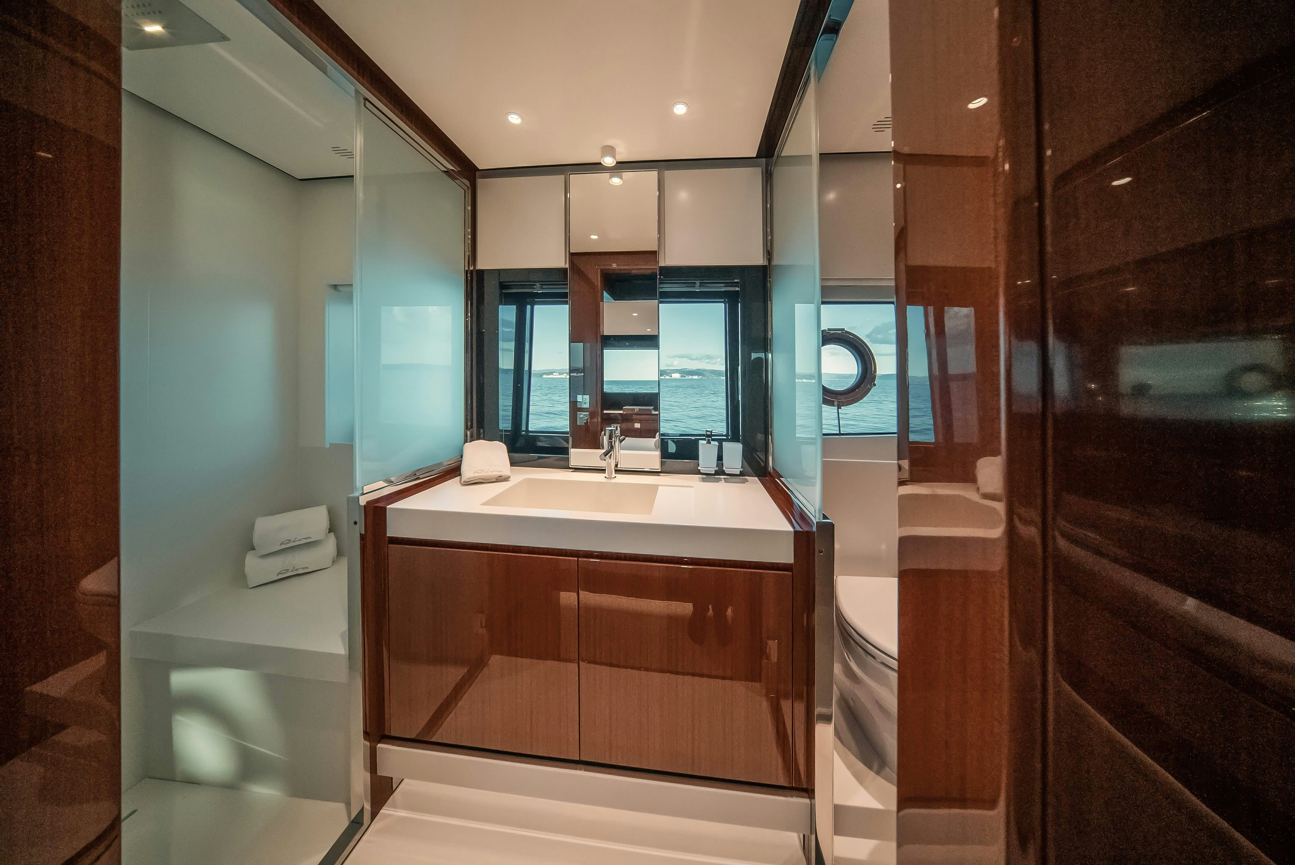 a bathroom with a sink and a shower aboard DIABLE Yacht for Sale