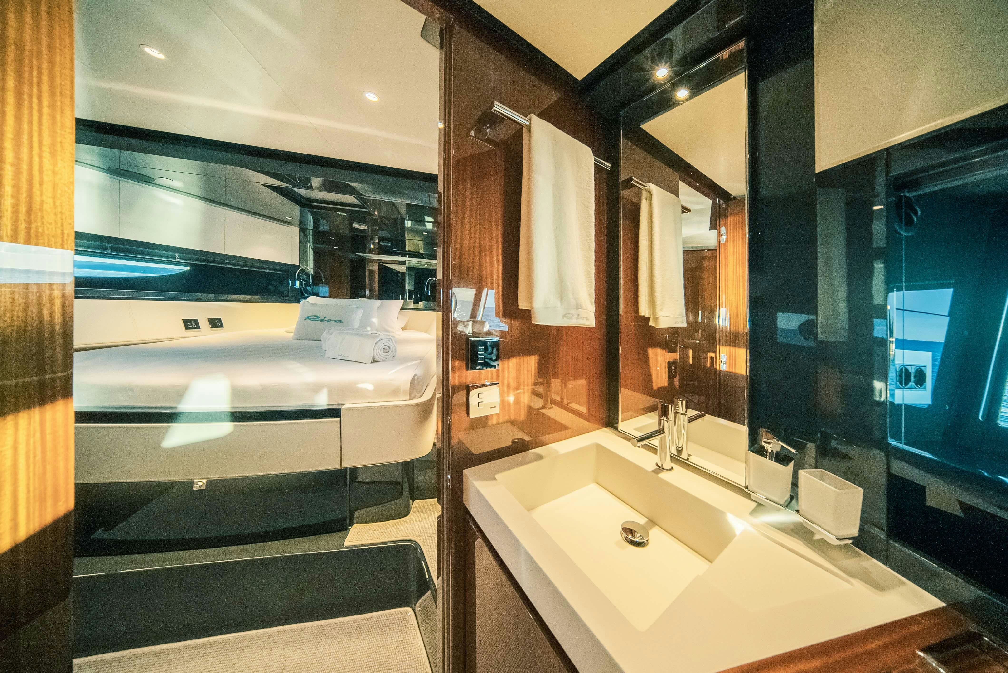 a bathroom with a large bathtub aboard DIABLE Yacht for Sale