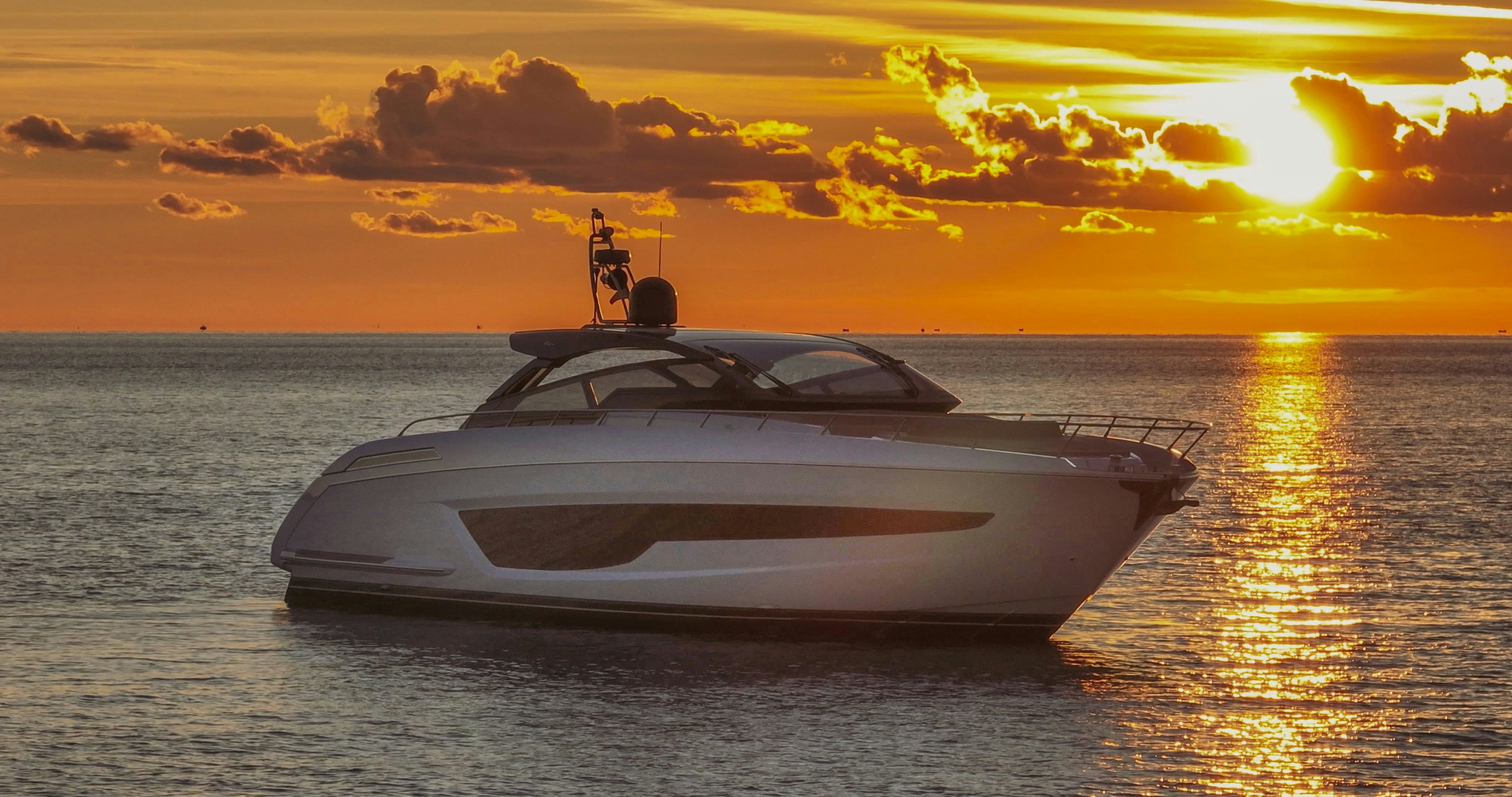 a white boat on the water aboard DIABLE Yacht for Sale