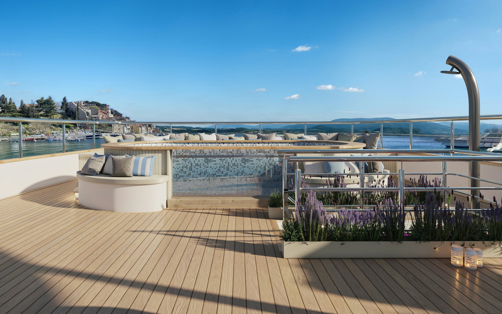 a deck with a view of a city and water aboard BELLA Yacht for Charter