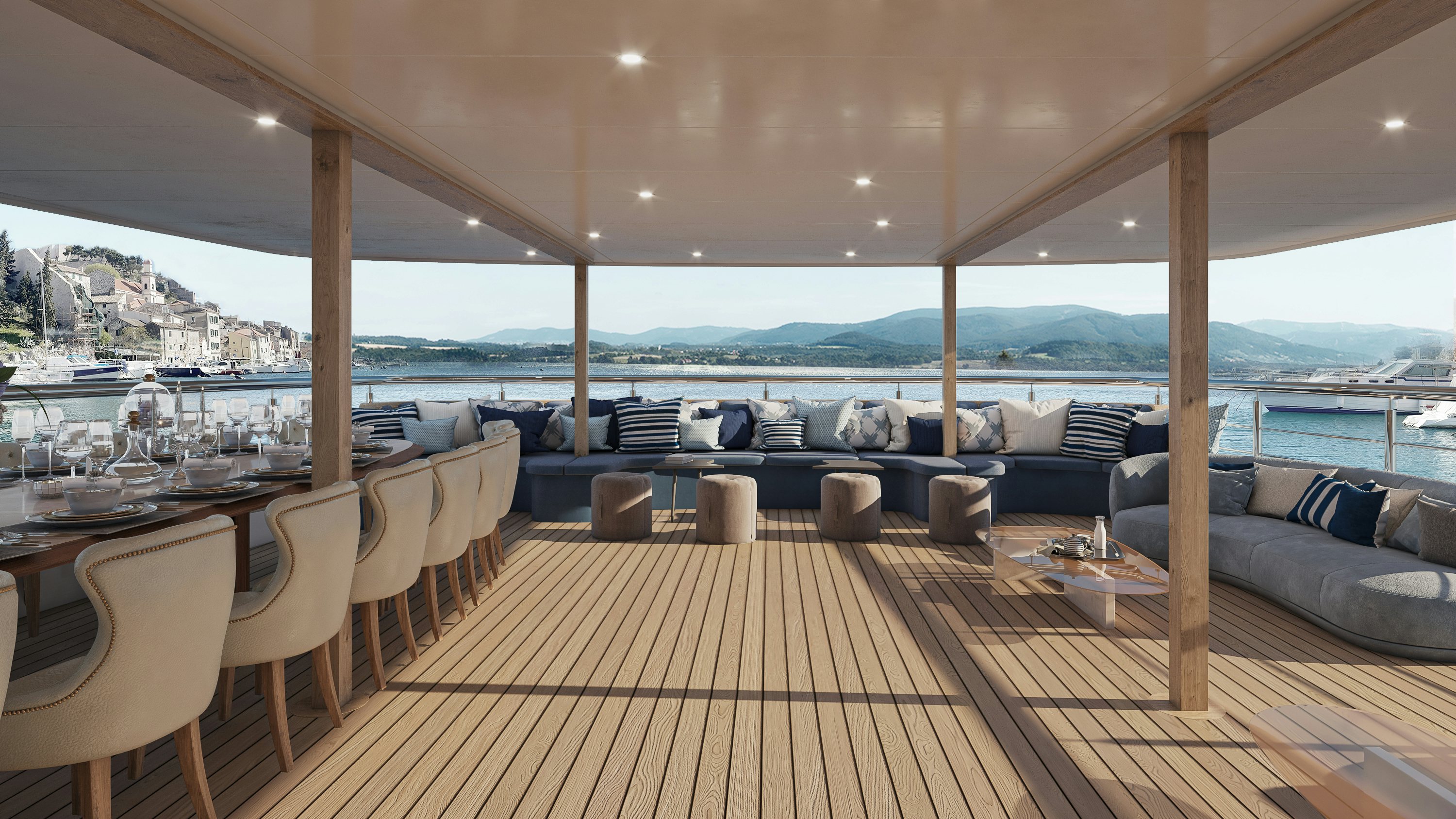 a wood deck with a wood deck and a large city in the background aboard BELLA Yacht for Charter