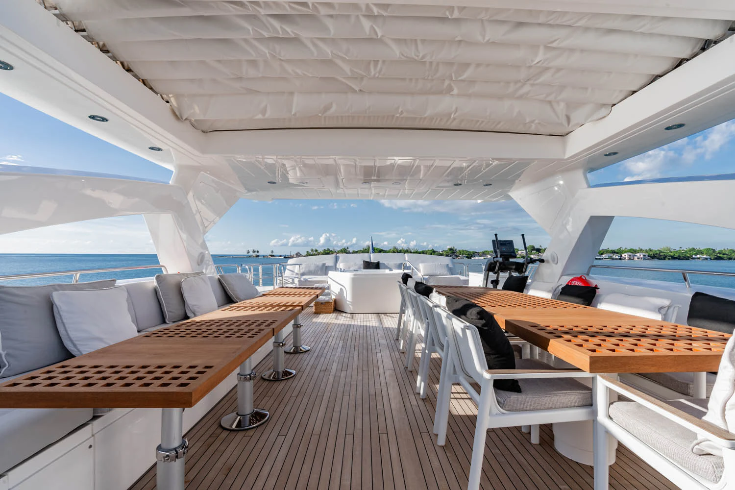 a deck with a view of the water and the deck aboard LUNA ROSSA Yacht for Charter