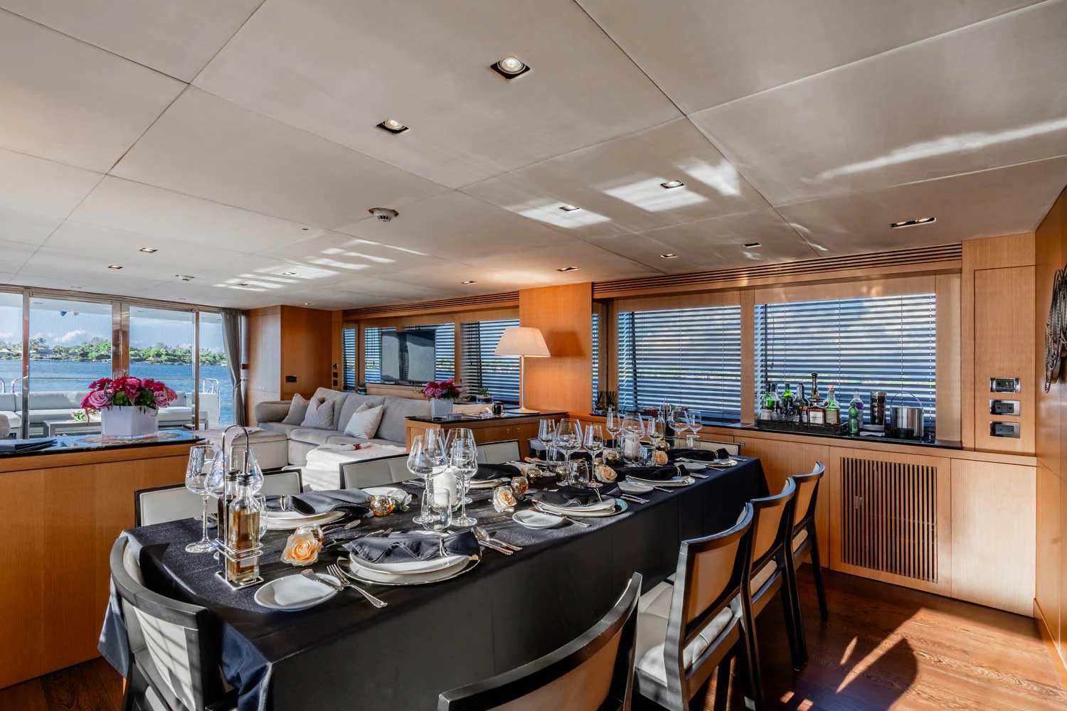 a large dining table in a kitchen aboard LUNA ROSSA Yacht for Charter