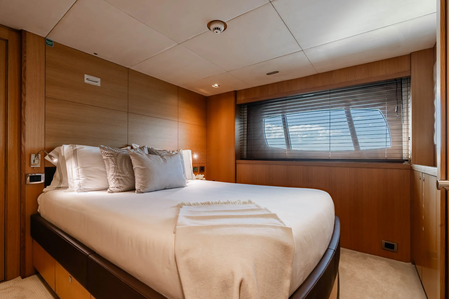 a bed in a room aboard LUNA ROSSA Yacht for Charter