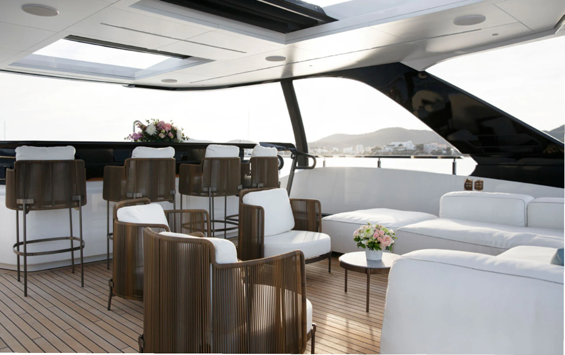 a room with chairs and tables aboard PERLA BIANCA Yacht for Charter