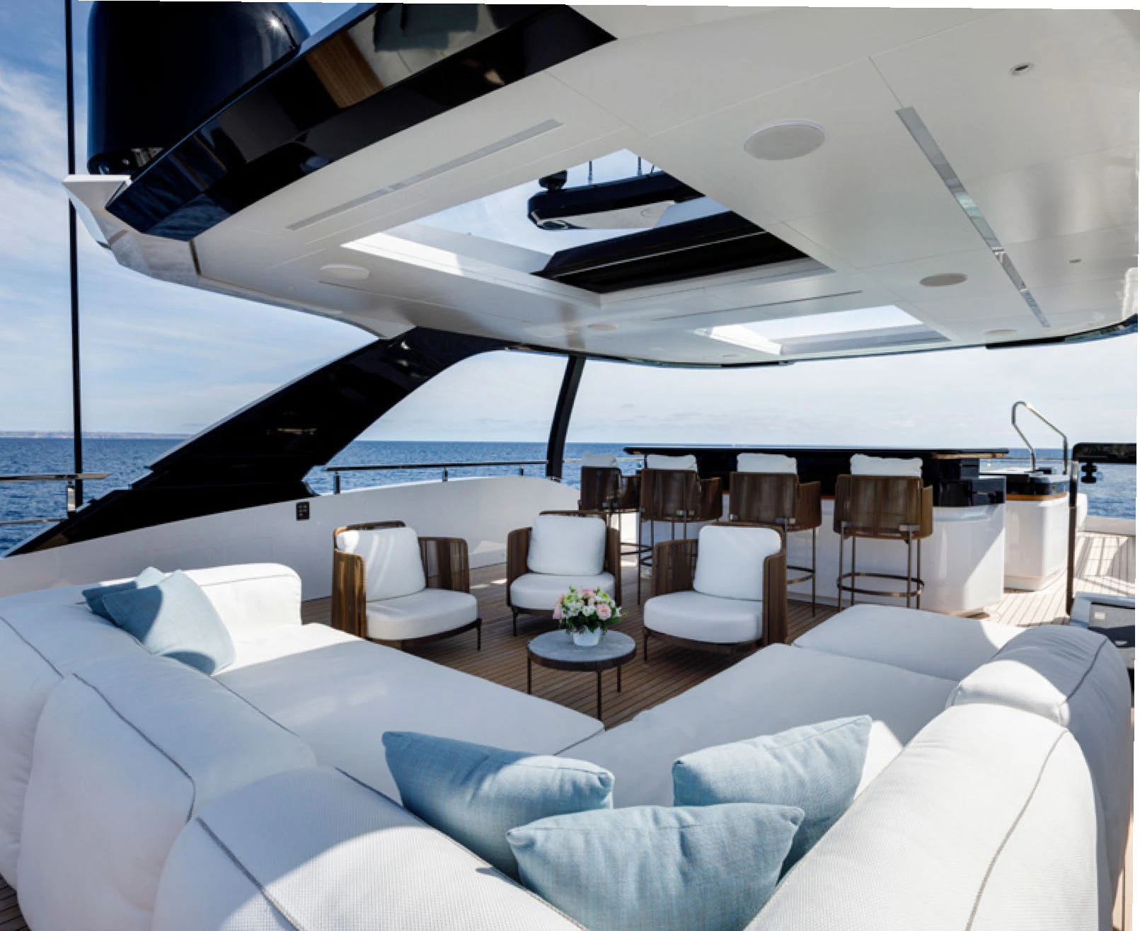 a large yacht with a large white lounge chair and a large white bed aboard PERLA BIANCA Yacht for Charter