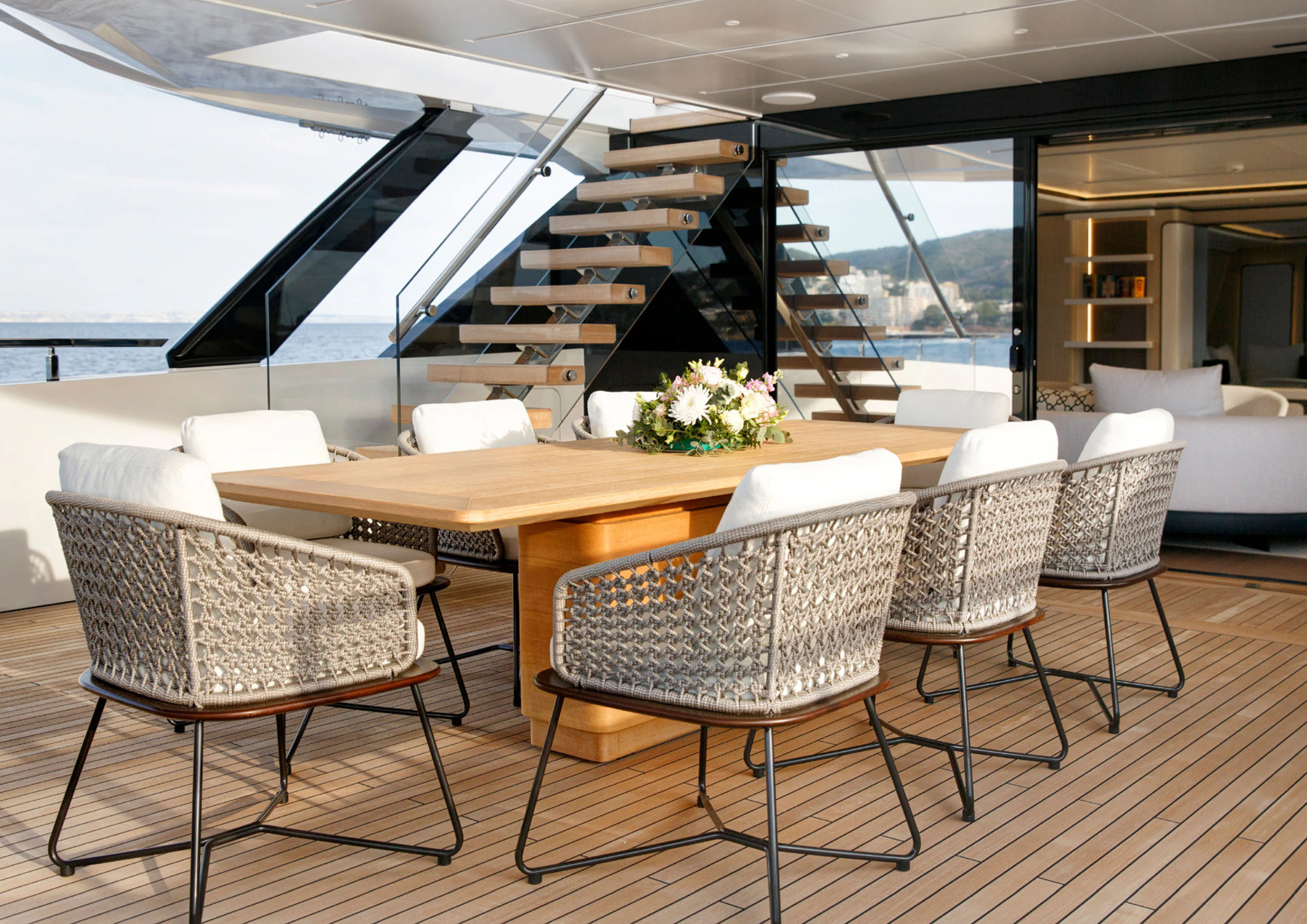 a room with a table and chairs aboard PERLA BIANCA Yacht for Charter