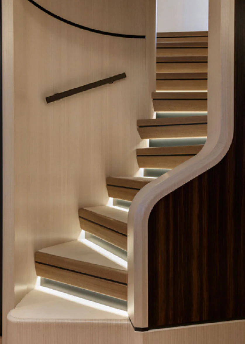 a wooden staircase with a sword aboard PERLA BIANCA Yacht for Charter