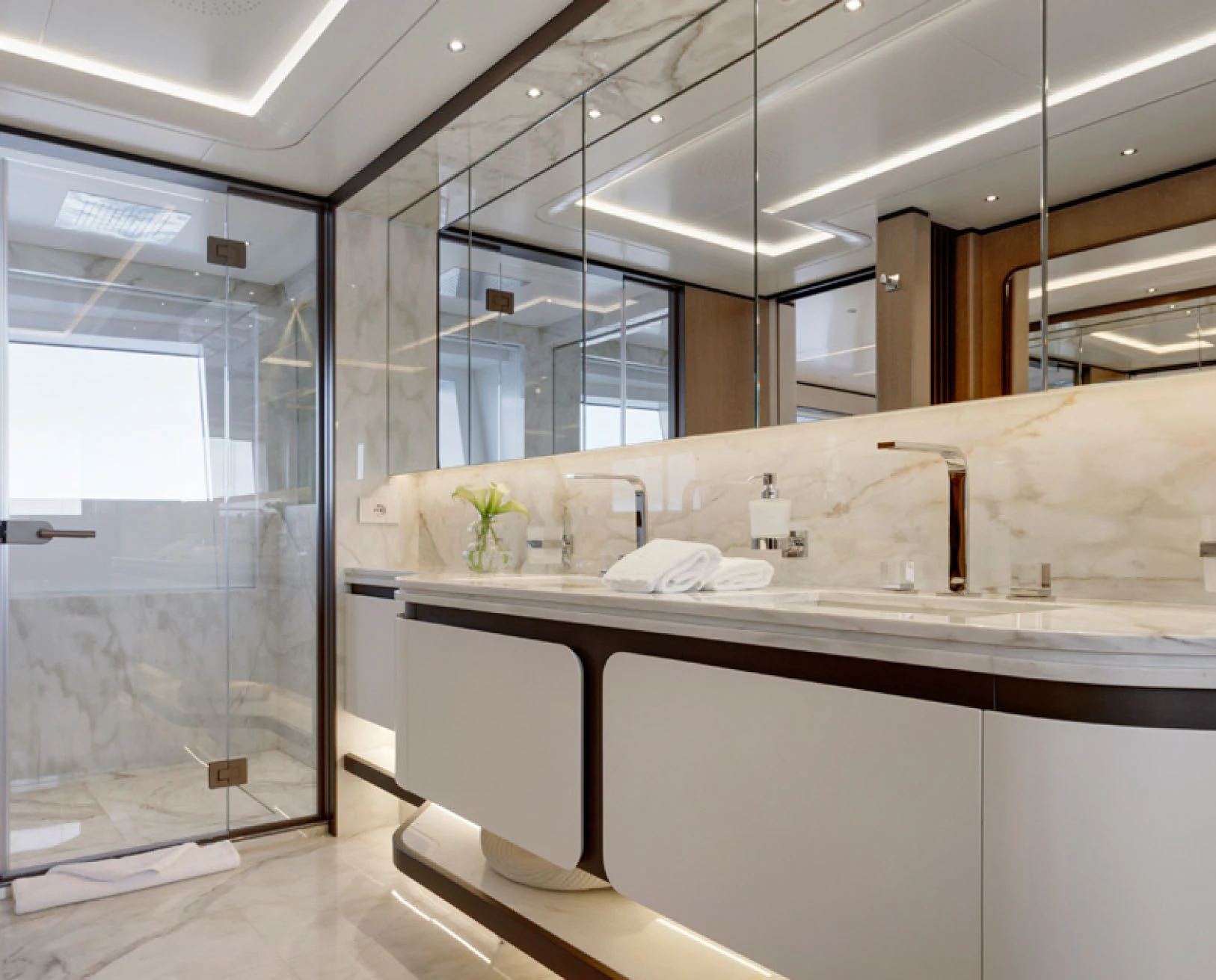a bathroom with a glass shower aboard PERLA BIANCA Yacht for Charter