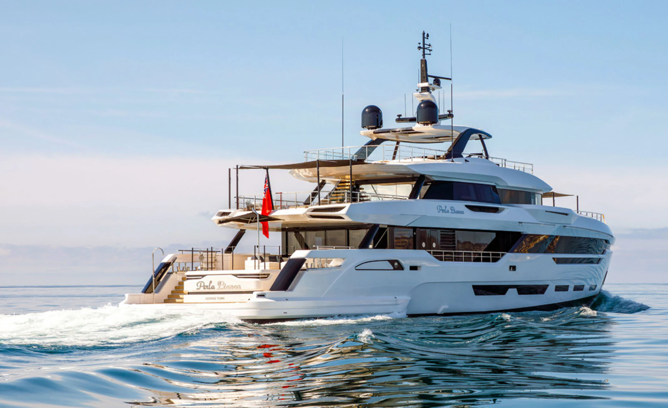 a white boat on the water aboard PERLA BIANCA Yacht for Charter