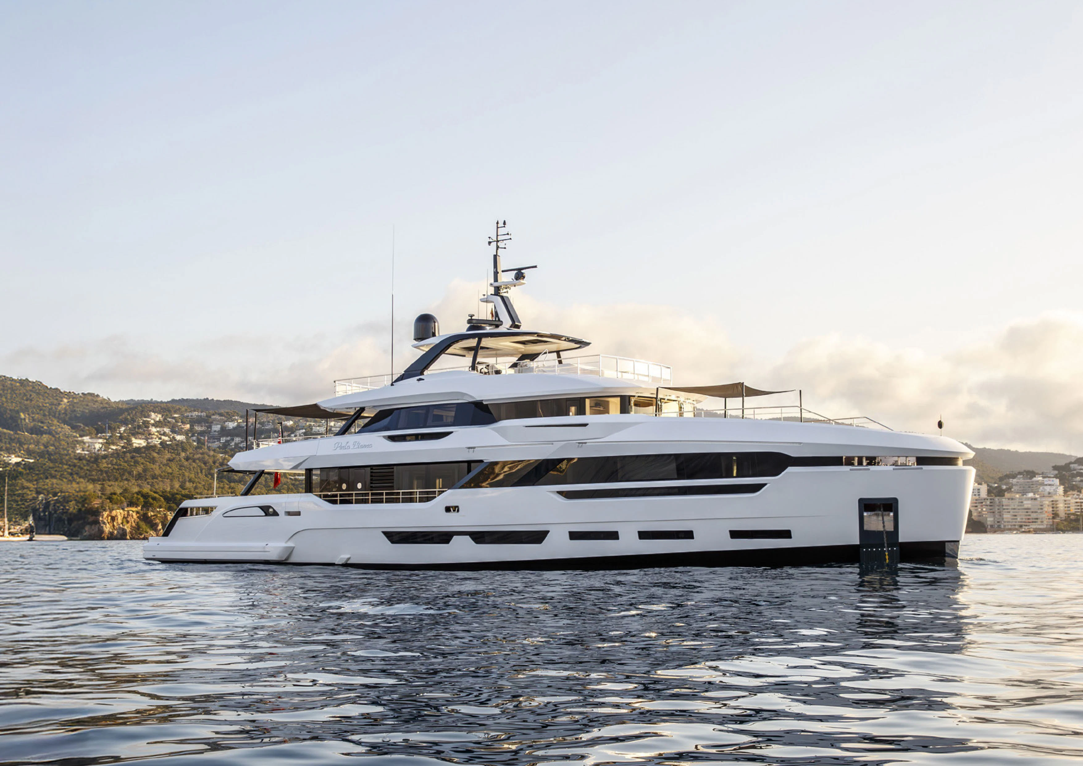 a white yacht in the water aboard PERLA BIANCA Yacht for Charter
