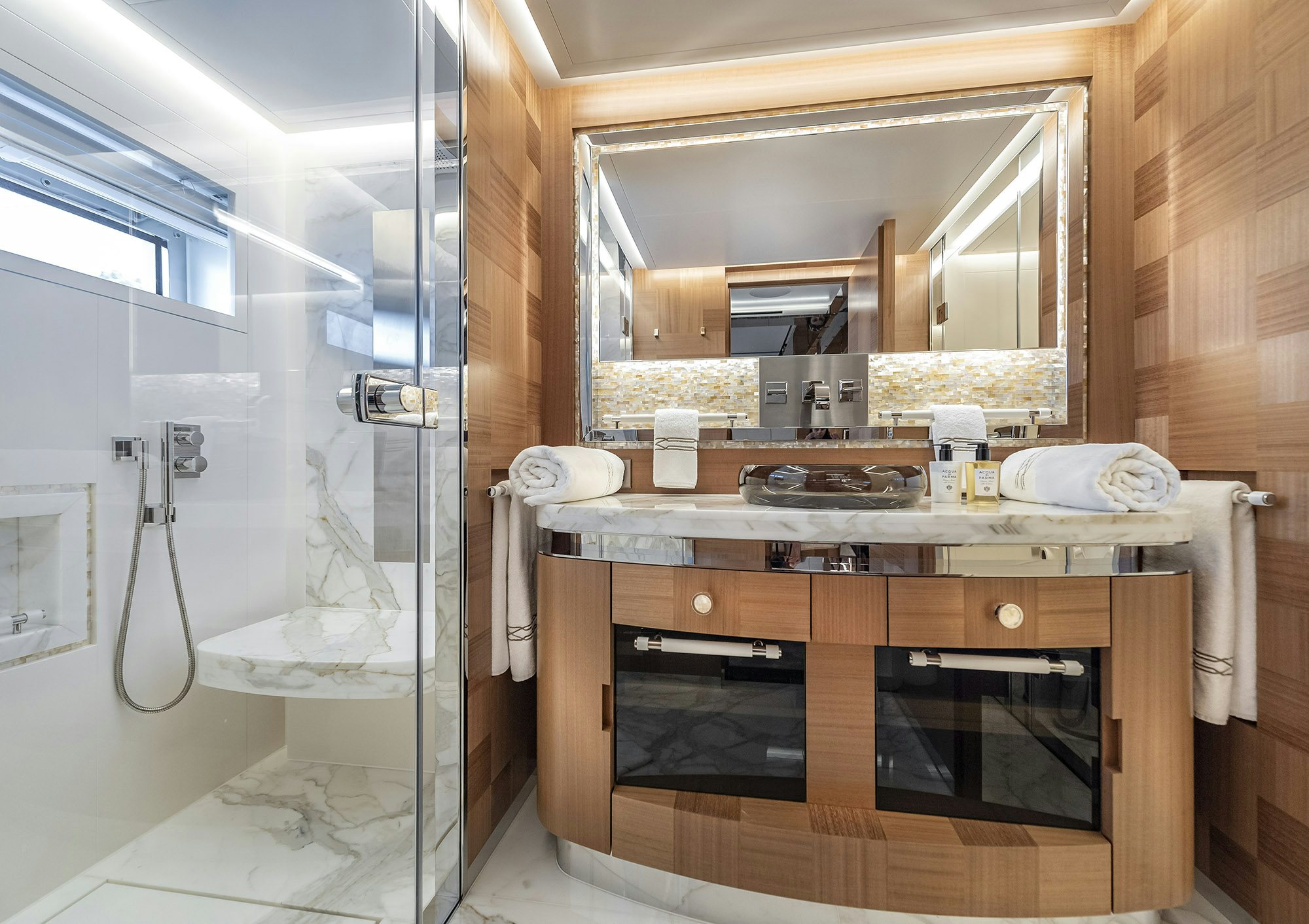 a bathroom with a sink and a mirror aboard SUNRISE Yacht for Sale
