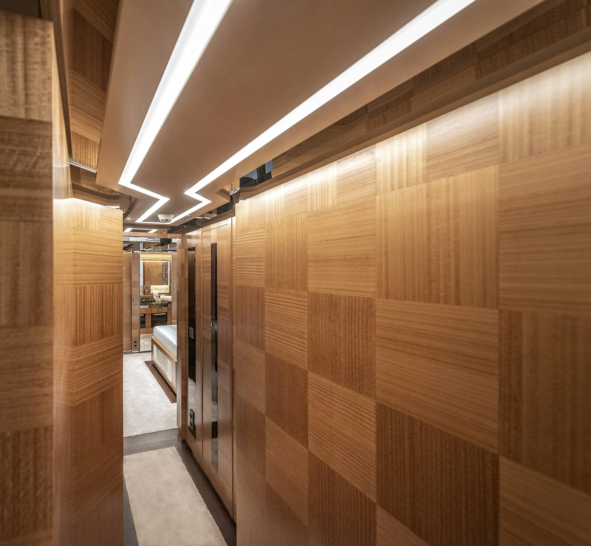 a hallway with wooden walls aboard SUNRISE Yacht for Sale