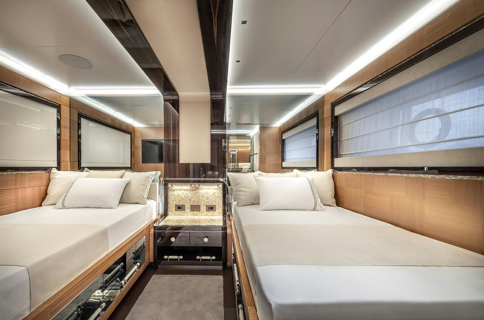 a room with two beds aboard SUNRISE Yacht for Sale