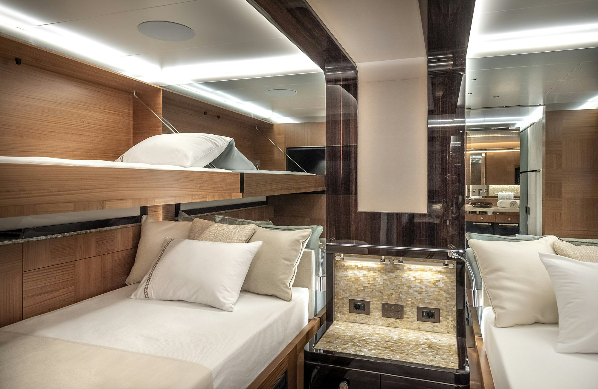 a room with a bed and a fireplace aboard SUNRISE Yacht for Sale
