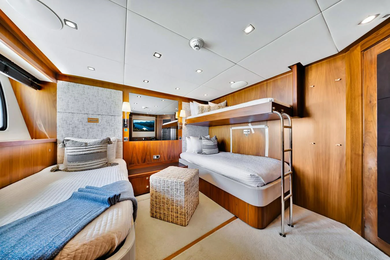 a room with bunk beds aboard NATURAL 9 Yacht for Charter