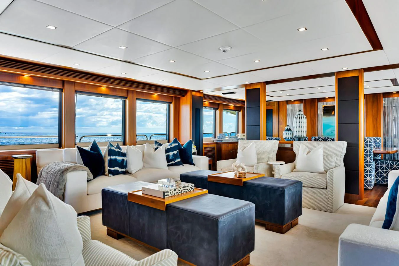 a living room with a large window aboard NATURAL 9 Yacht for Charter