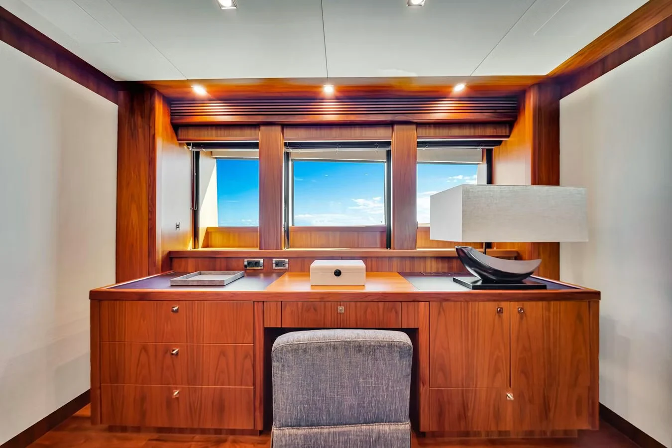 a room with a chair and a desk aboard NATURAL 9 Yacht for Charter