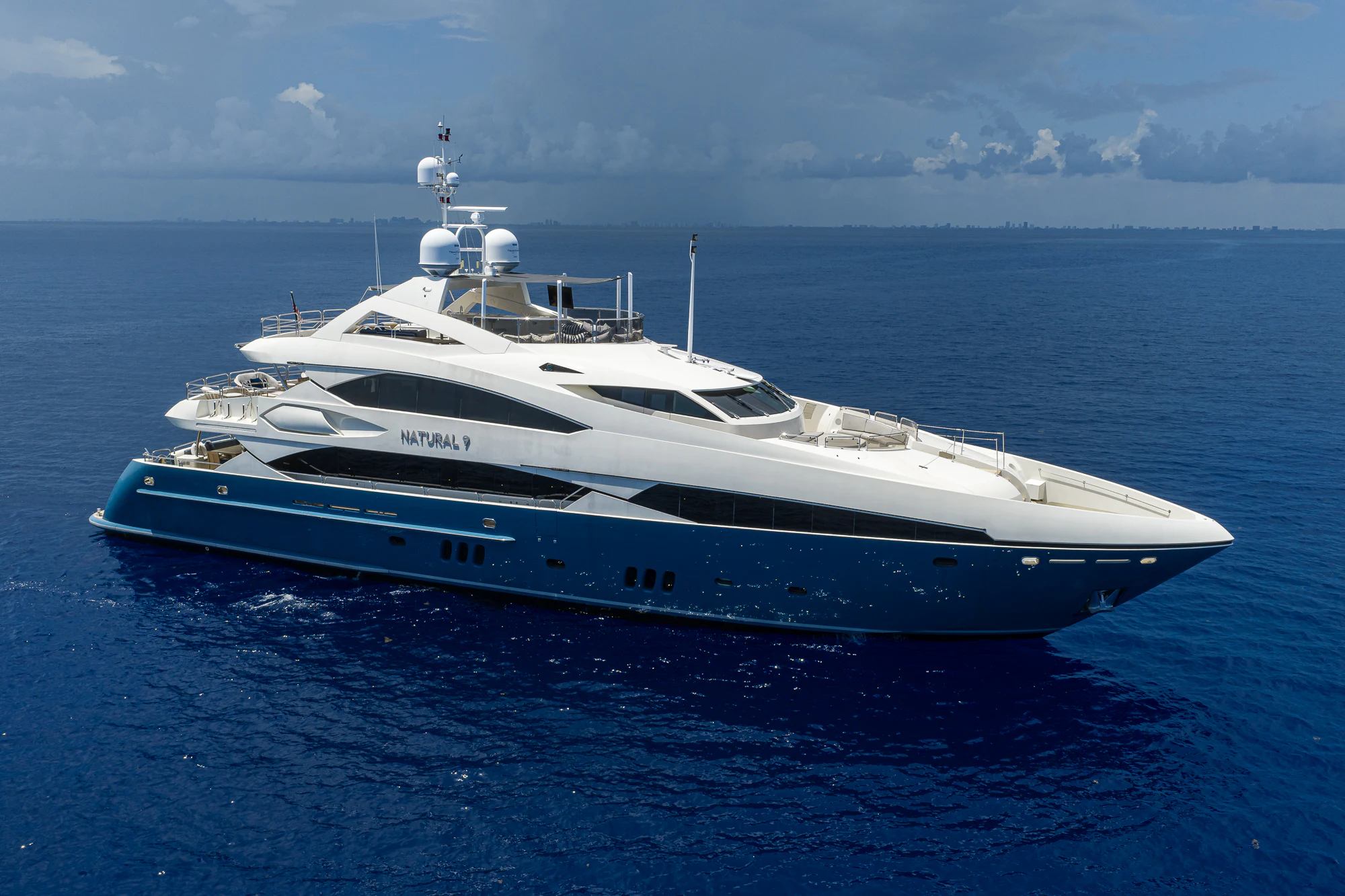 a large white boat in the water aboard NATURAL 9 Yacht for Sale