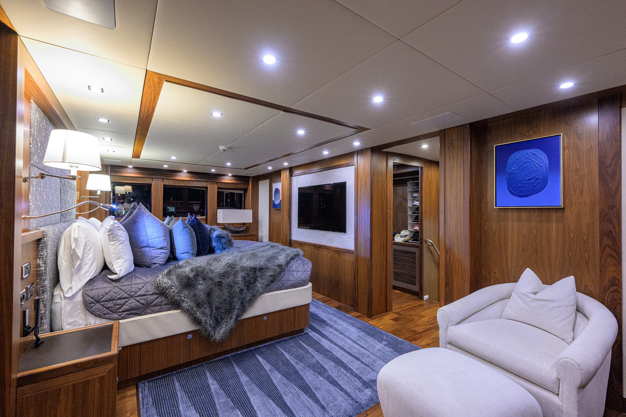 a bedroom with a large bed aboard NATURAL 9 Yacht for Sale