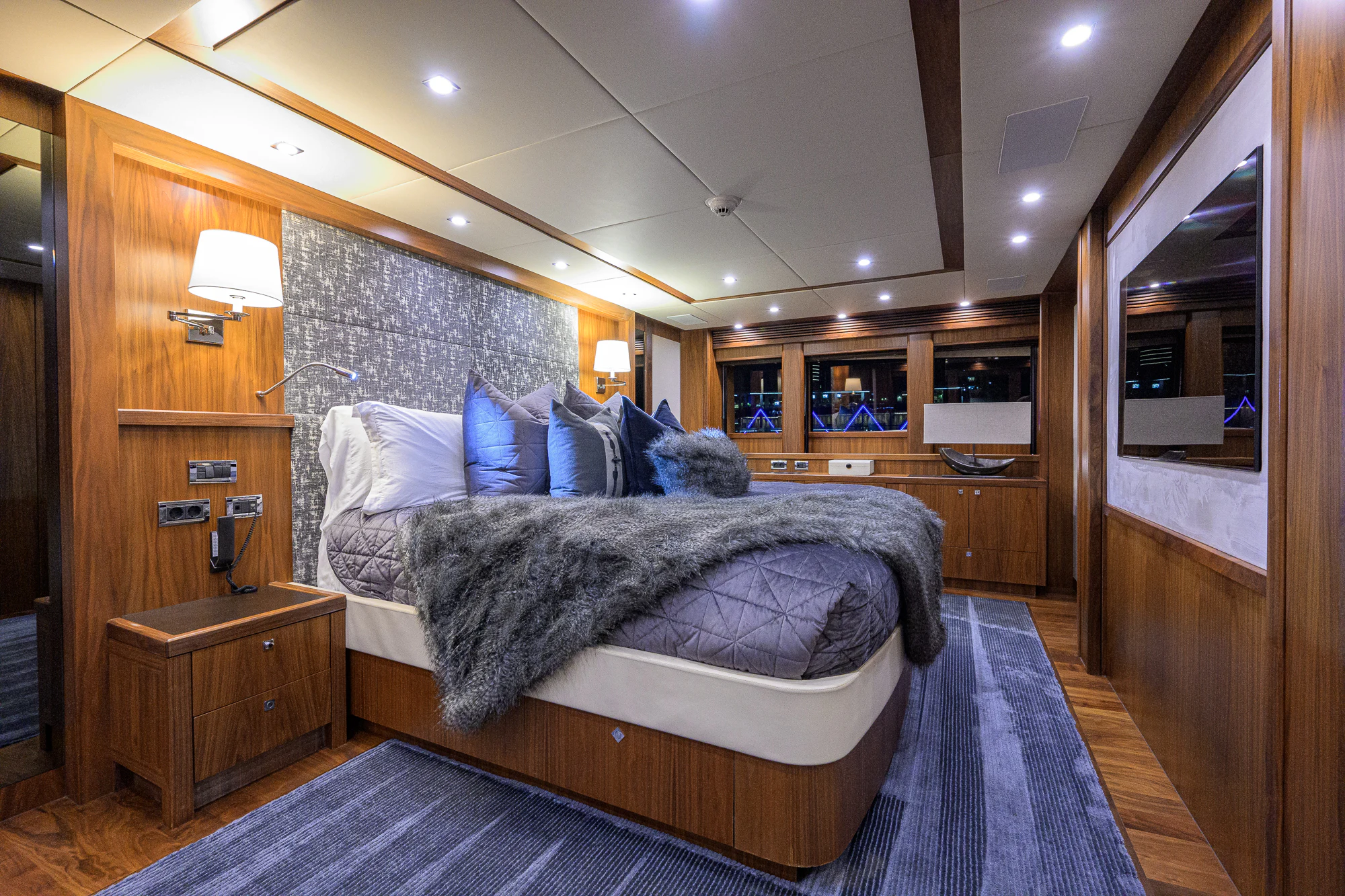 a large bedroom with a large bed aboard NATURAL 9 Yacht for Sale