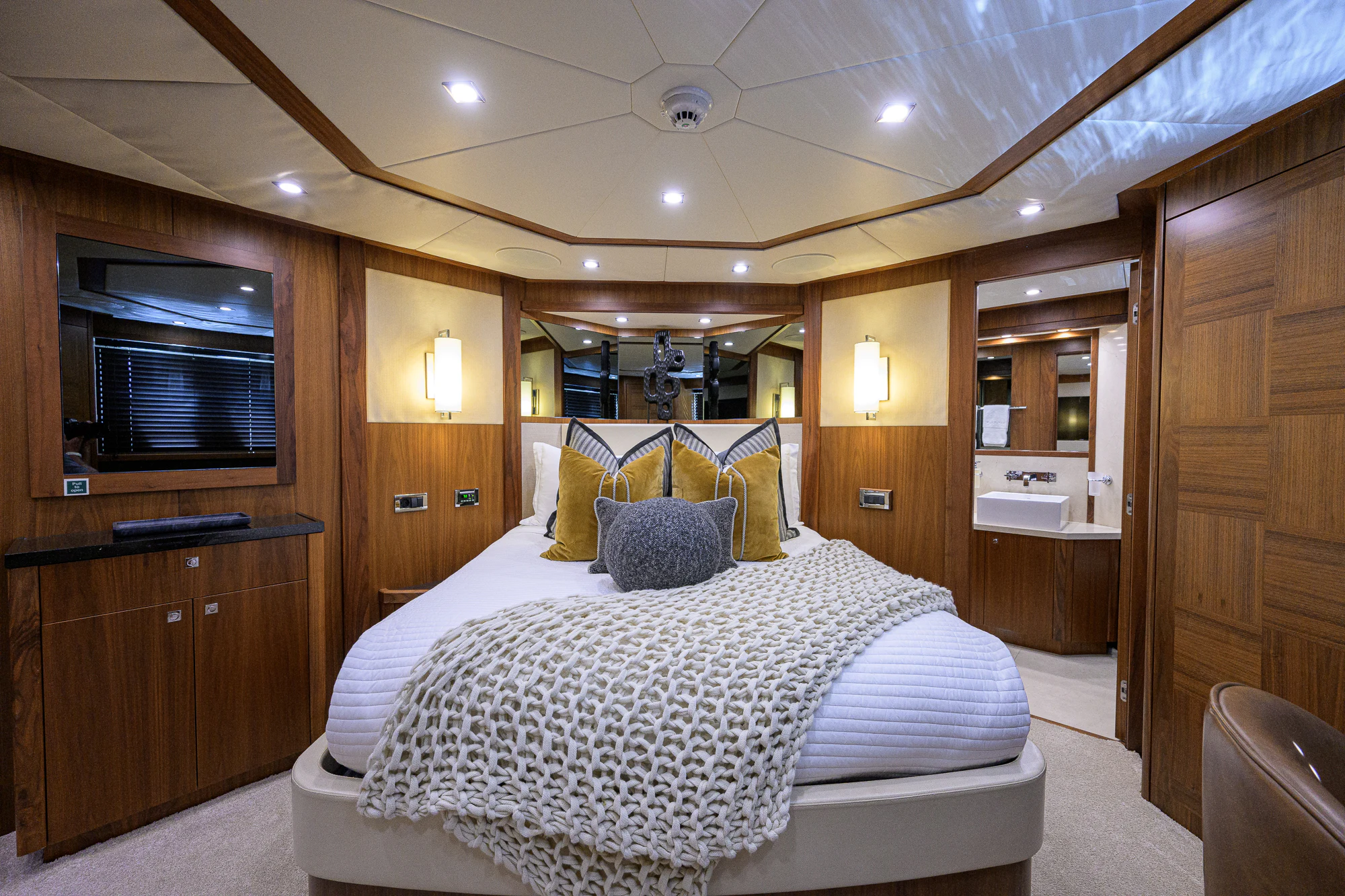 a bedroom with a bed aboard NATURAL 9 Yacht for Sale