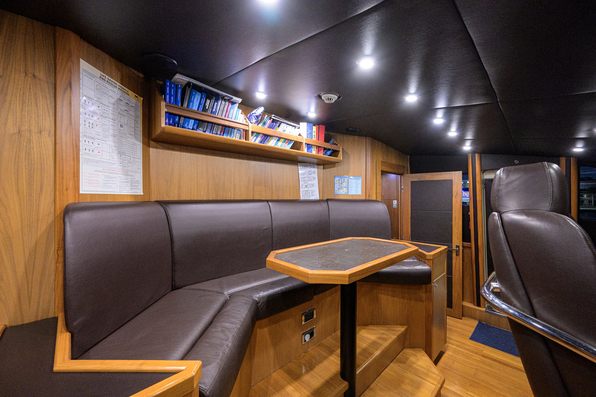 a leather couch in a room aboard NATURAL 9 Yacht for Sale