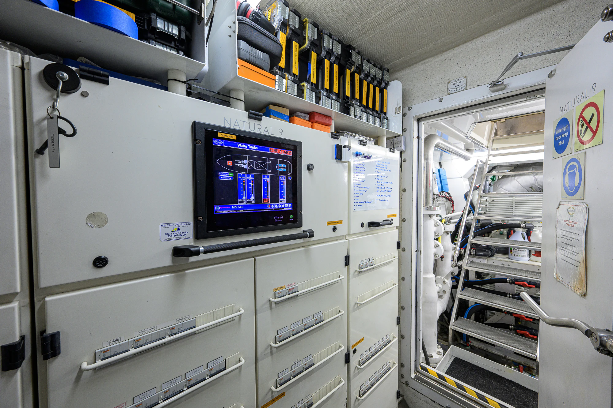 a large white machine with a screen aboard NATURAL 9 Yacht for Sale