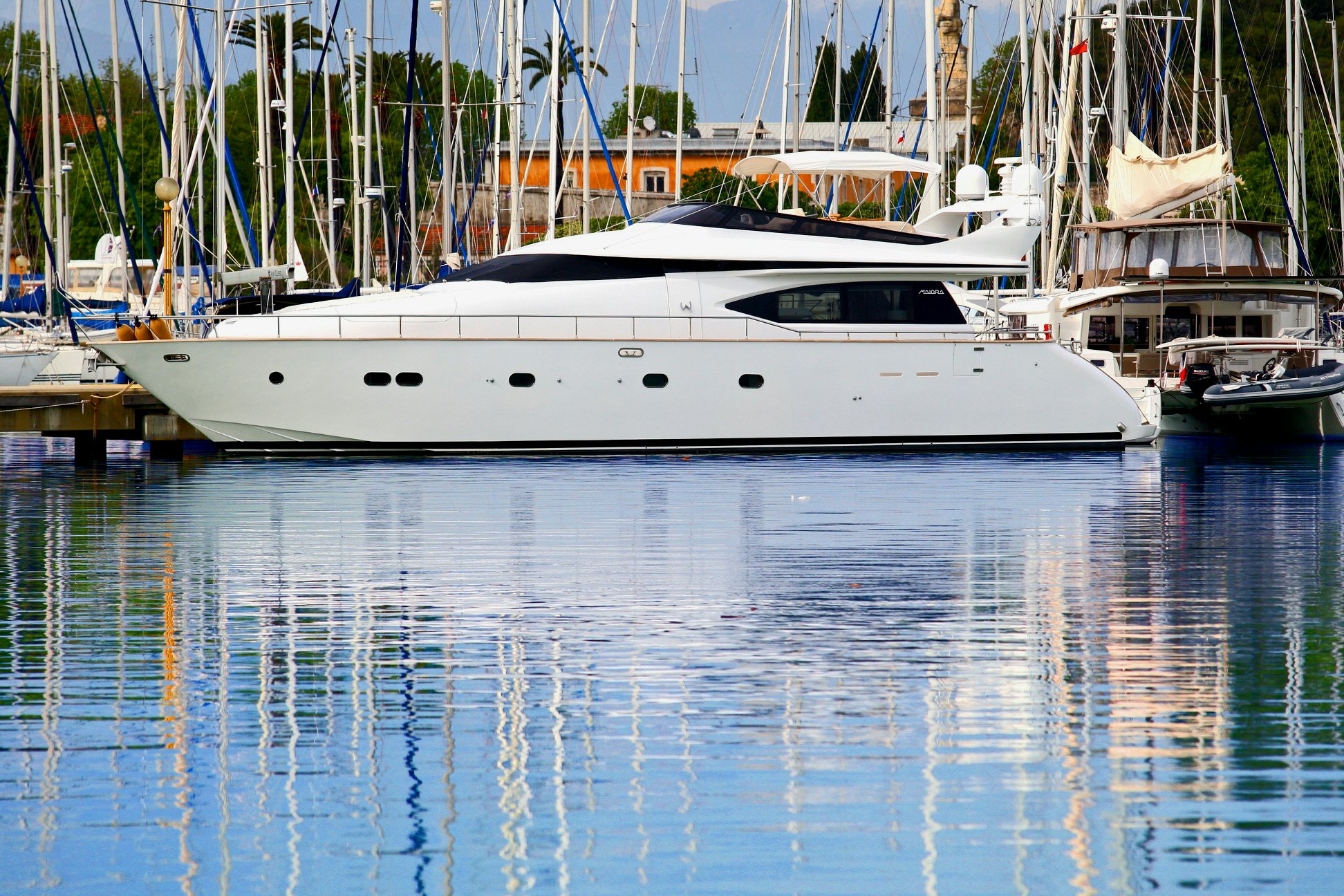 a boat parked on the water aboard YAKOS Yacht for Sale
