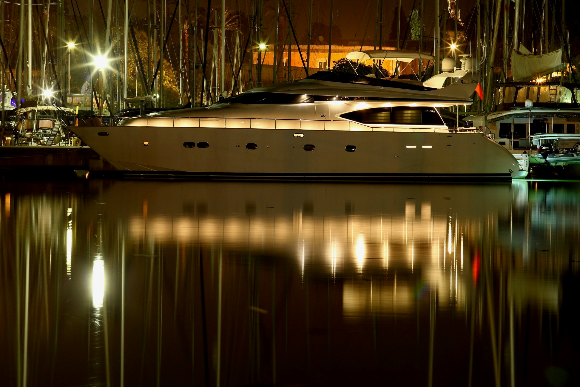 a boat parked on a dock aboard YAKOS Yacht for Sale