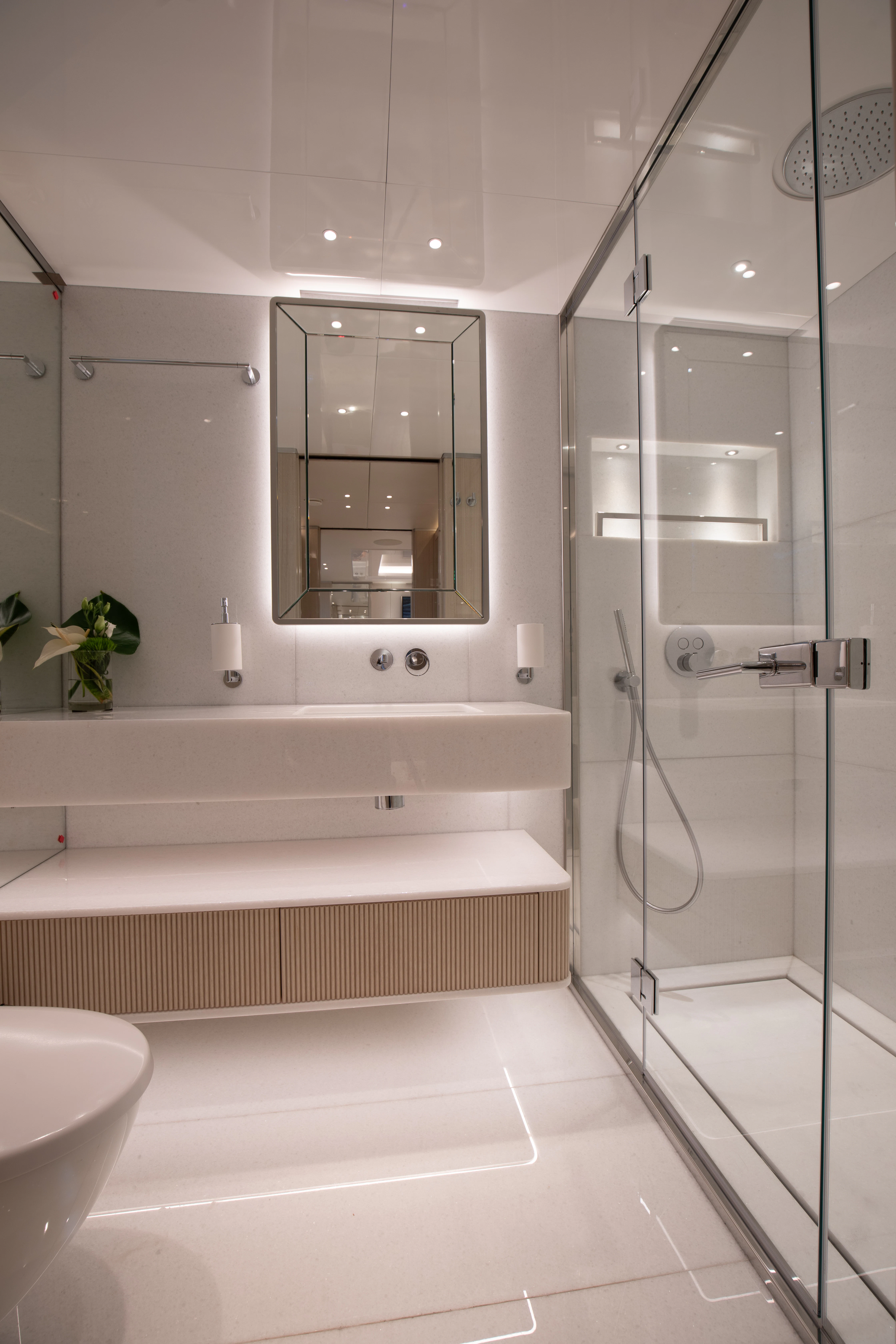 a bathroom with a glass shower aboard PERSEVERANCE Yacht for Charter