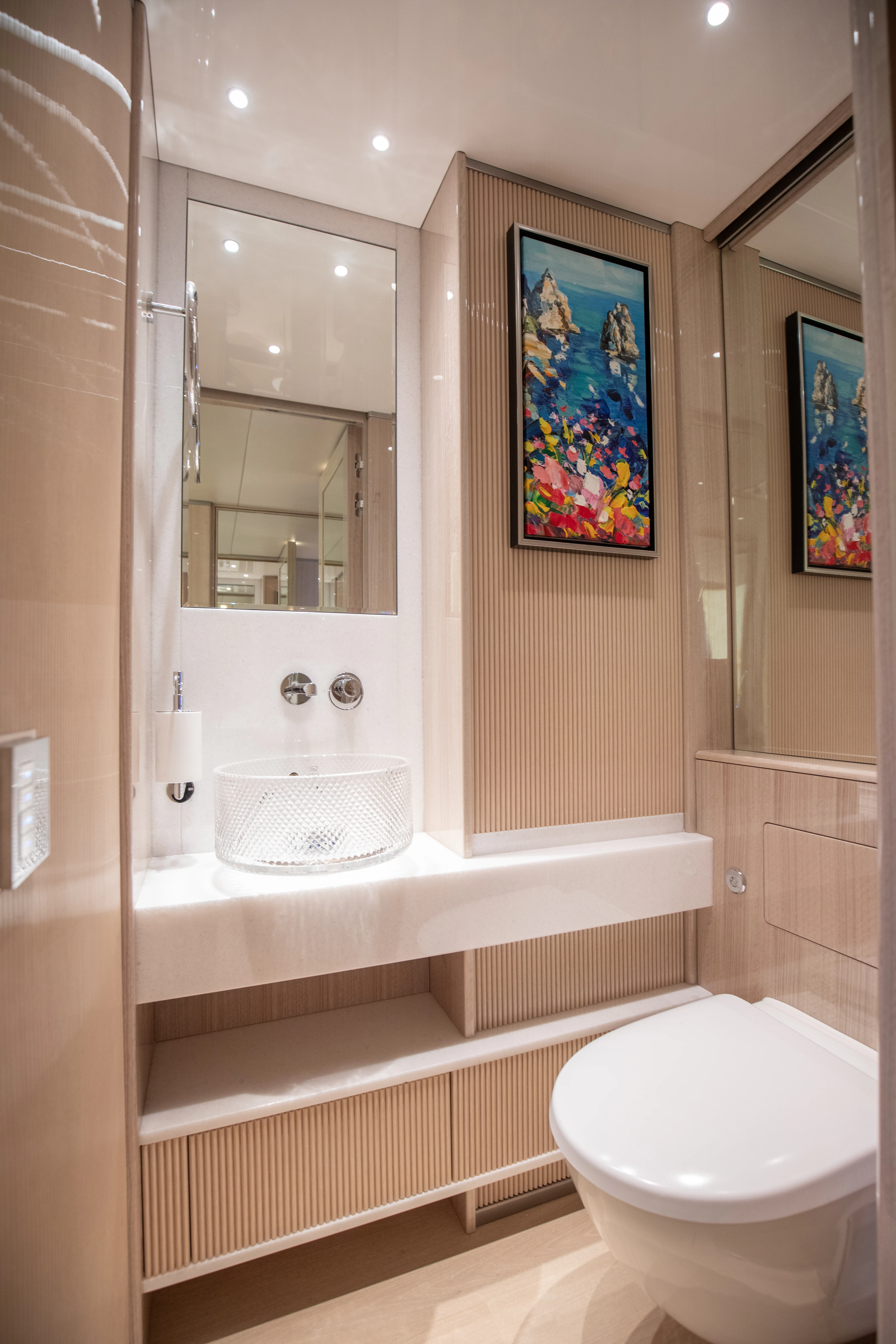 a bathroom with a toilet and a sink aboard PERSEVERANCE Yacht for Charter