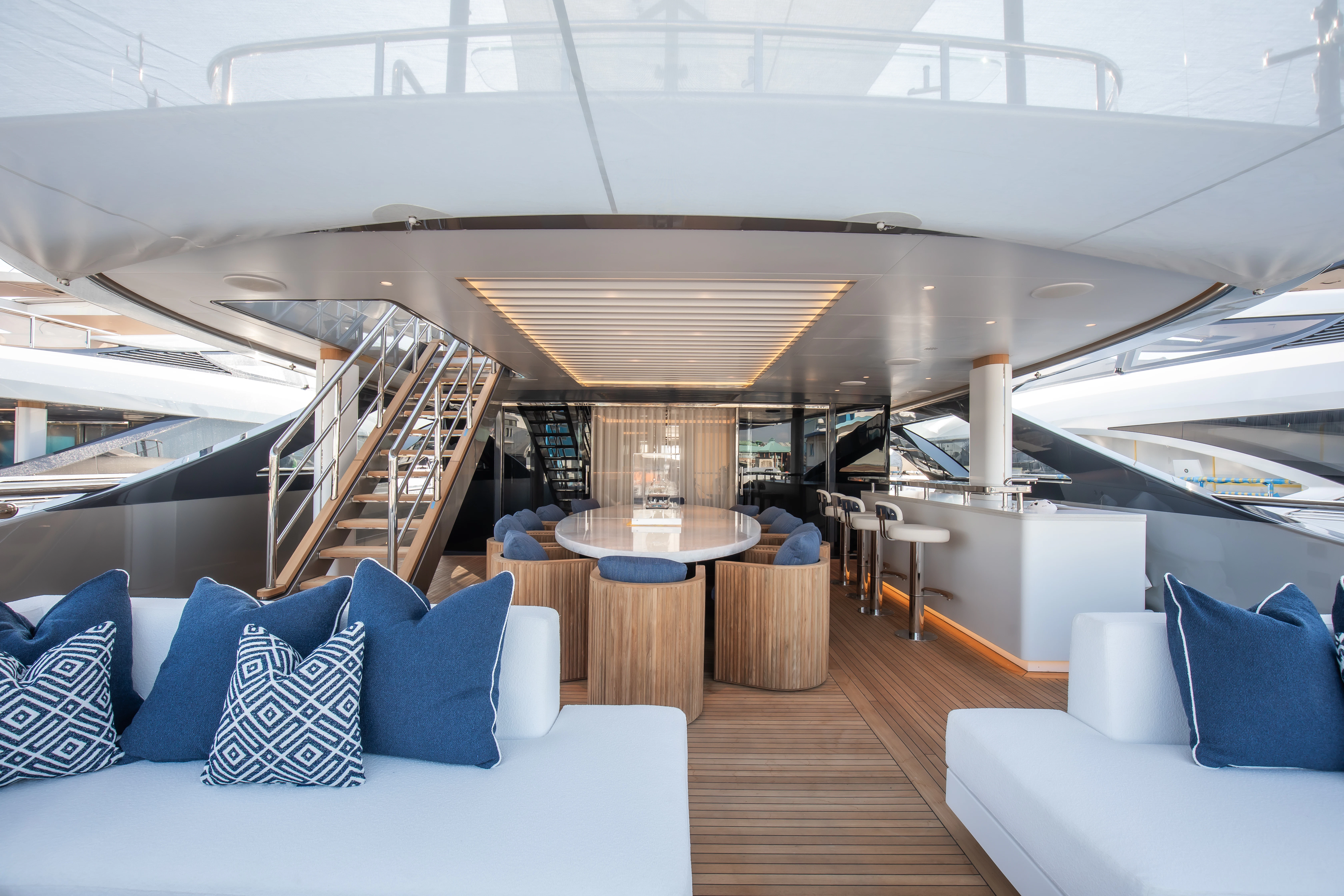 a room with a table and chairs aboard PERSEVERANCE Yacht for Charter