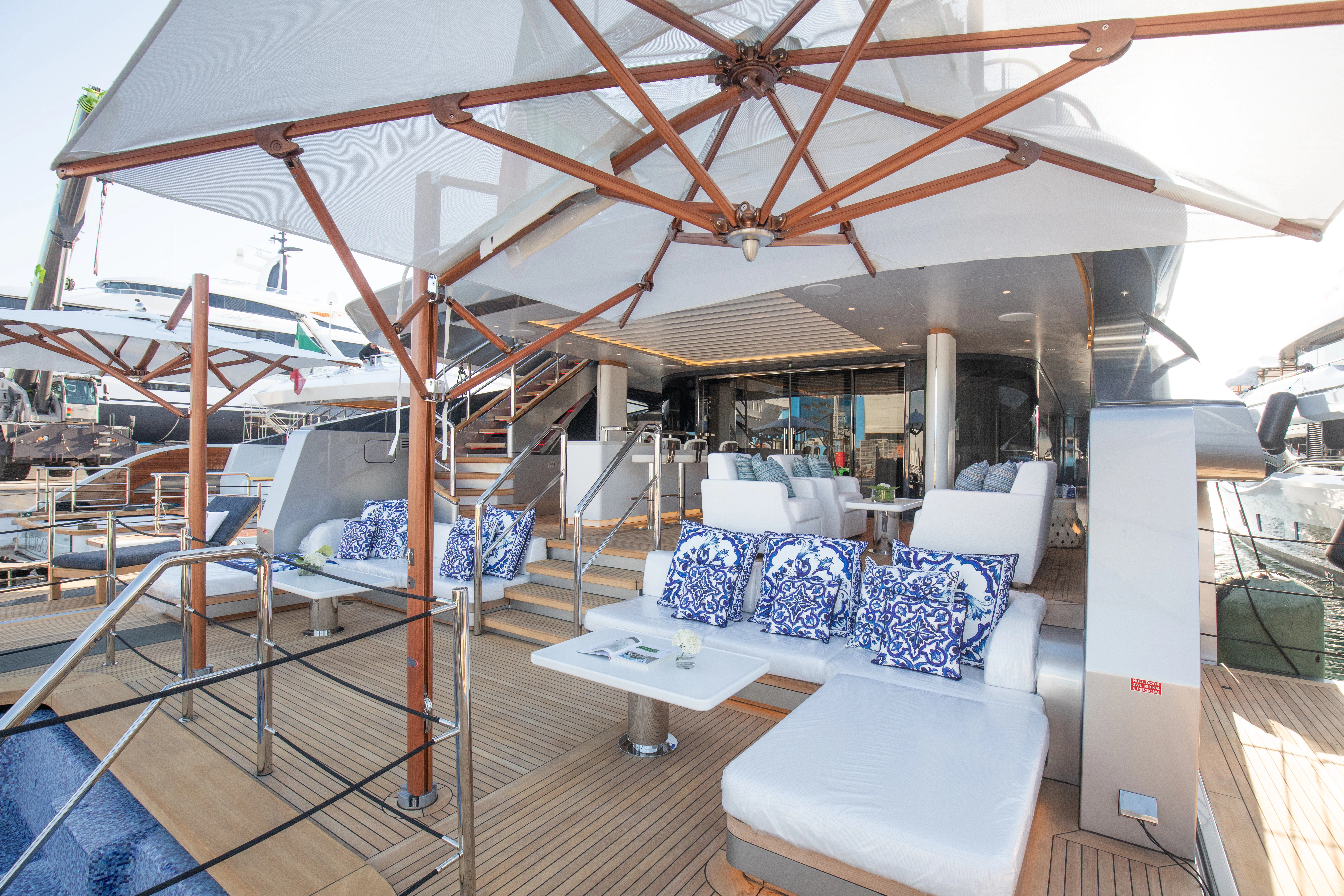 a boat with a table and chairs aboard PERSEVERANCE Yacht for Charter