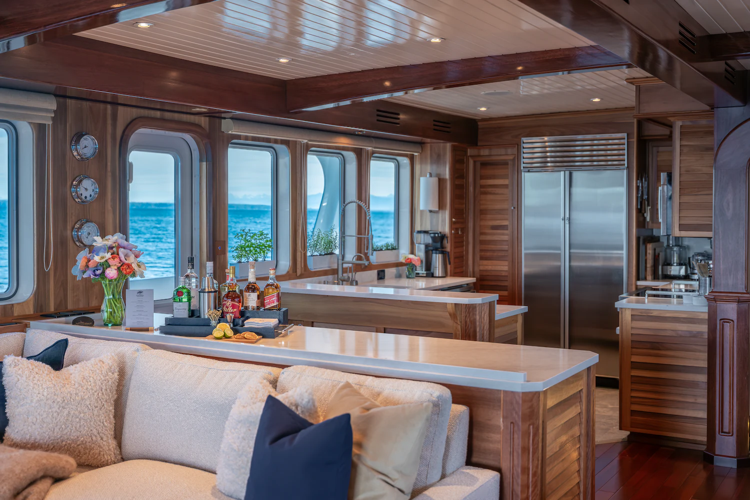 a living room with a large window aboard SURFBIRD Yacht for Charter