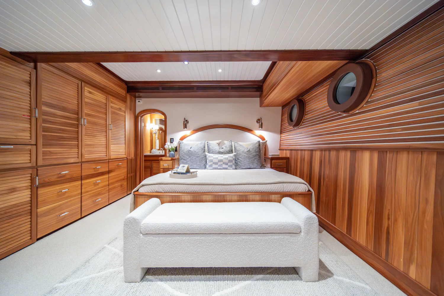 a bed in a wooden cabin aboard SURFBIRD Yacht for Charter