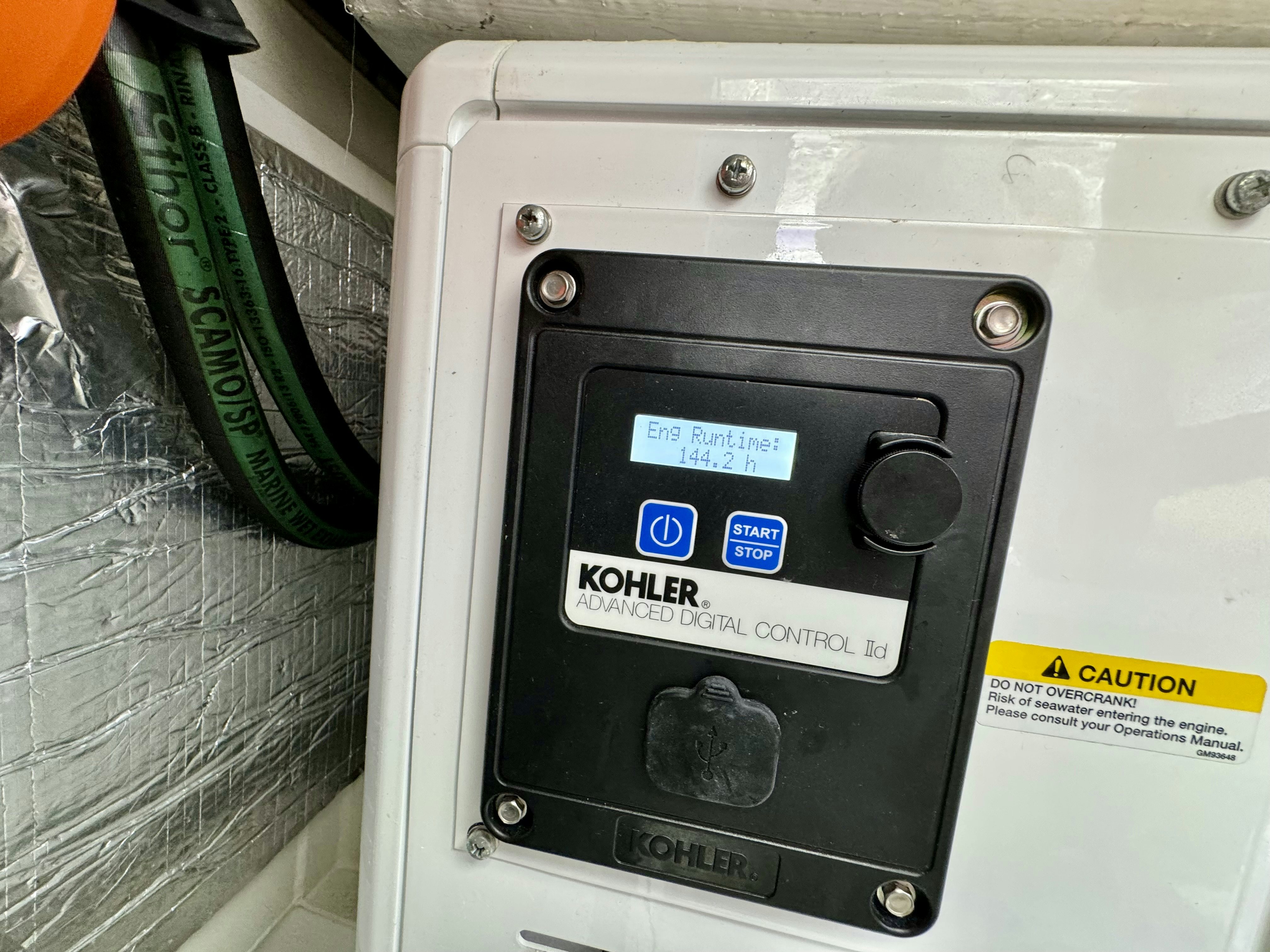 a black electronic device aboard GG Yacht for Sale