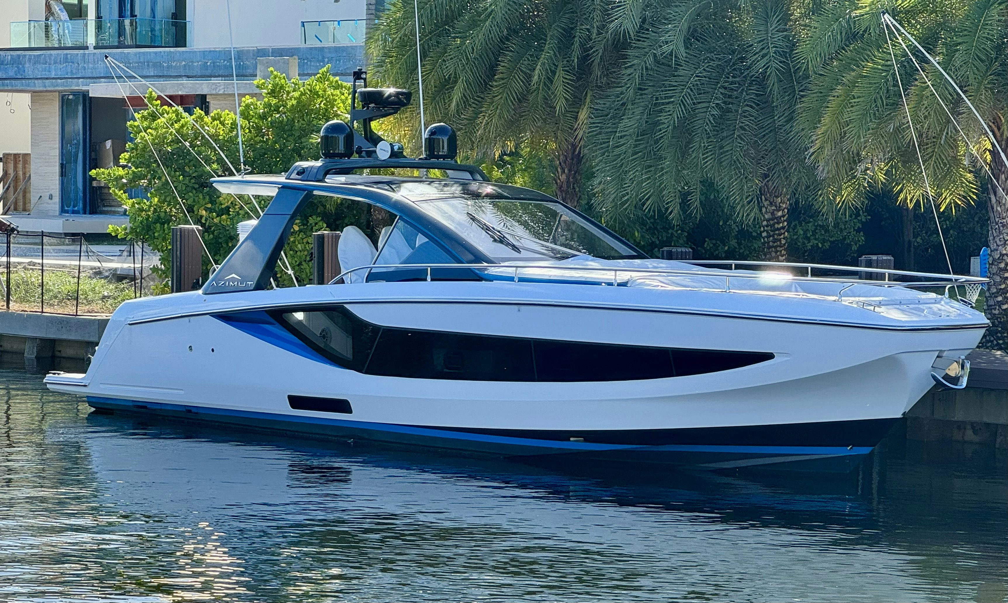 a white boat on the water aboard GG Yacht for Sale
