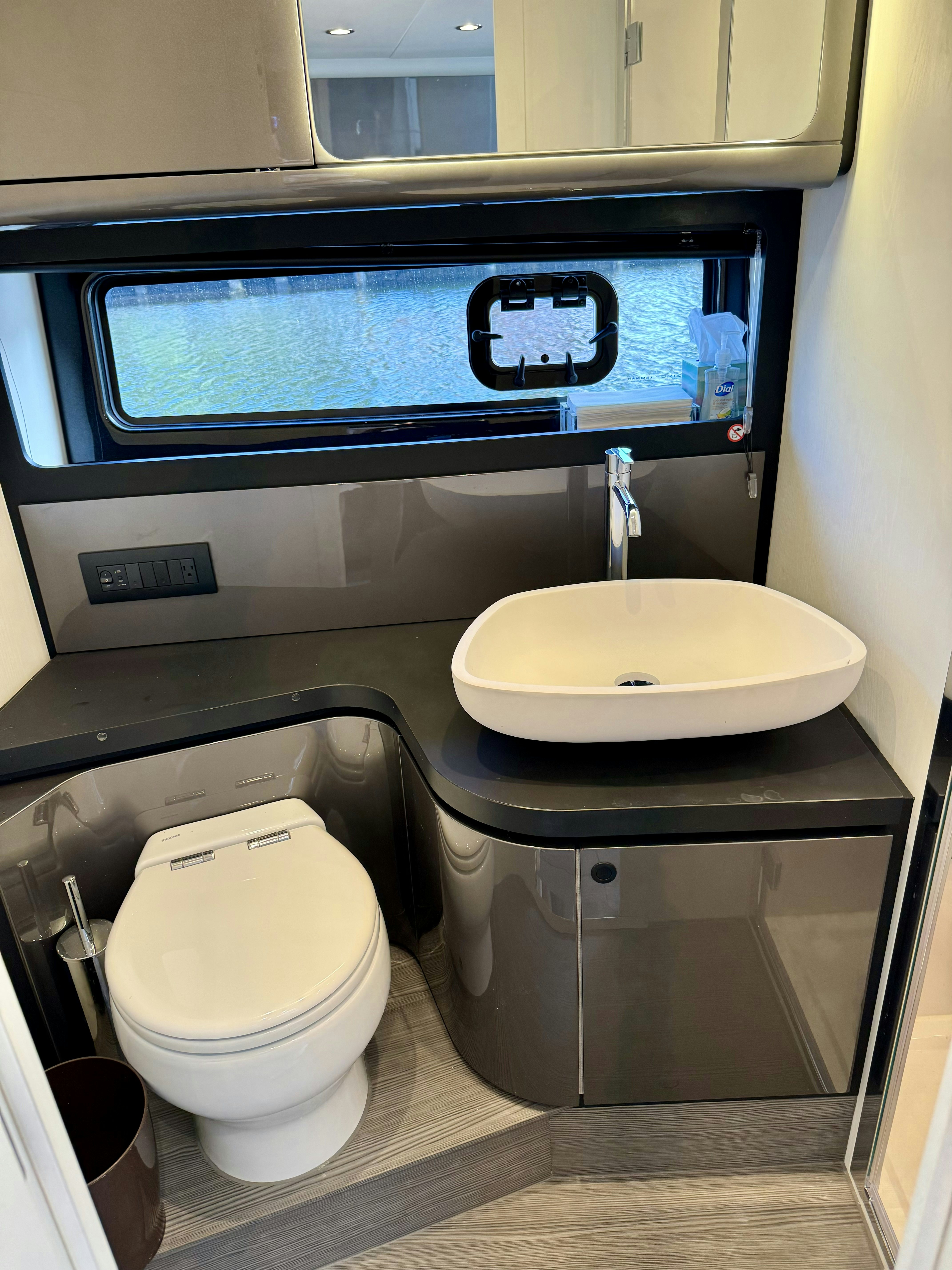 a bathroom with a sink and a toilet aboard GG Yacht for Sale
