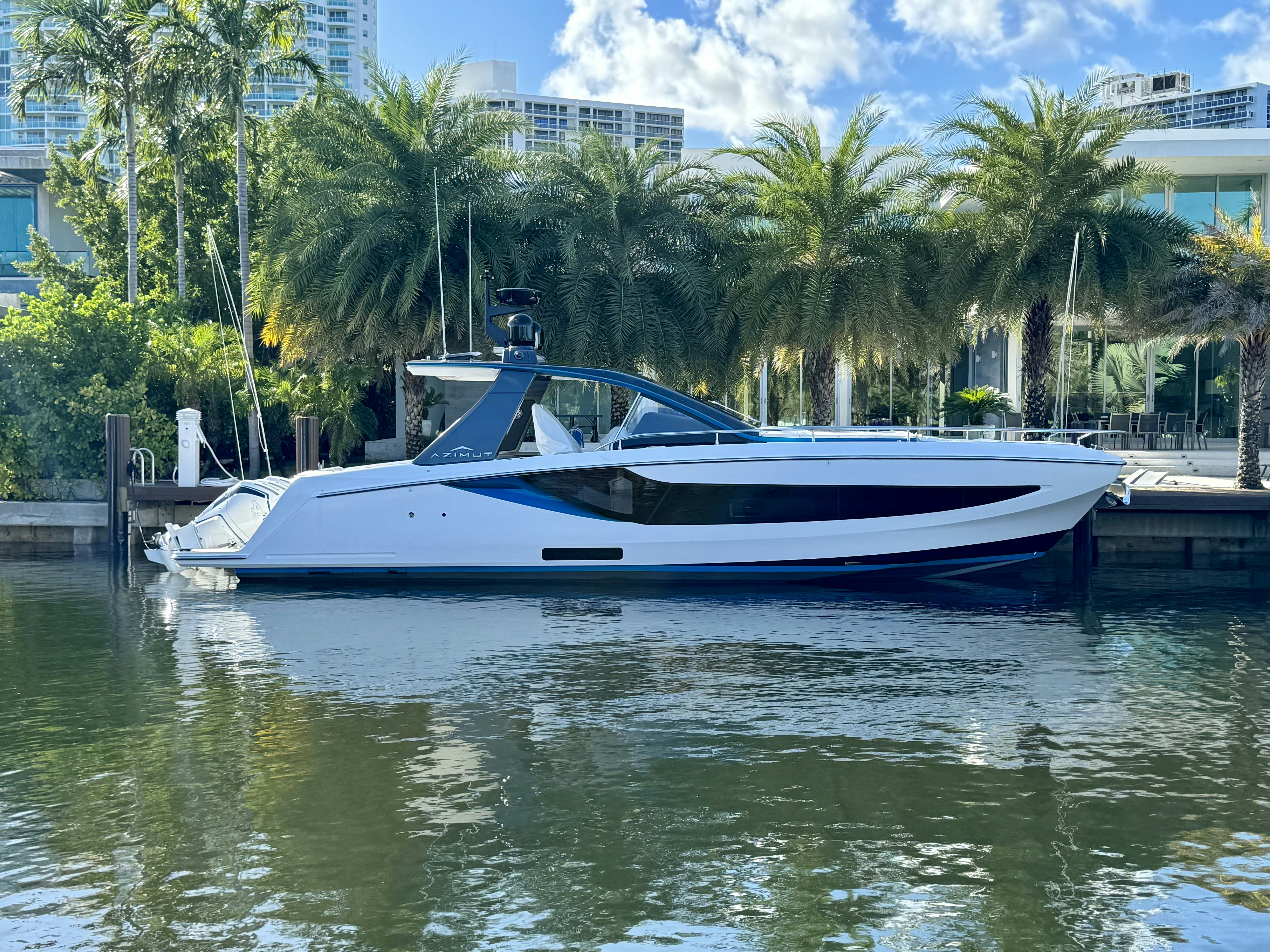a boat docked at a pier aboard GG Yacht for Sale