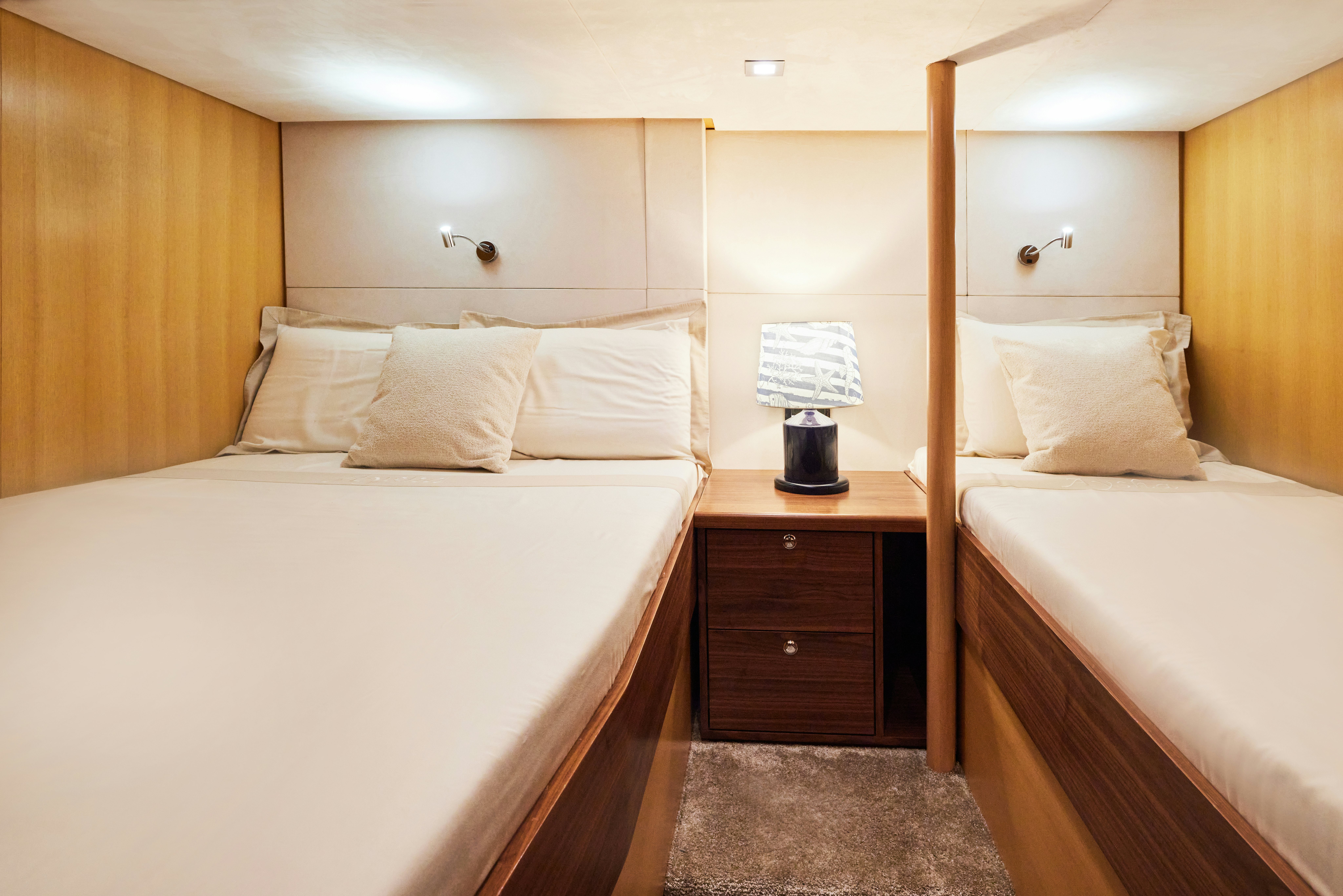 a room with two beds aboard AYSHA Yacht for Sale