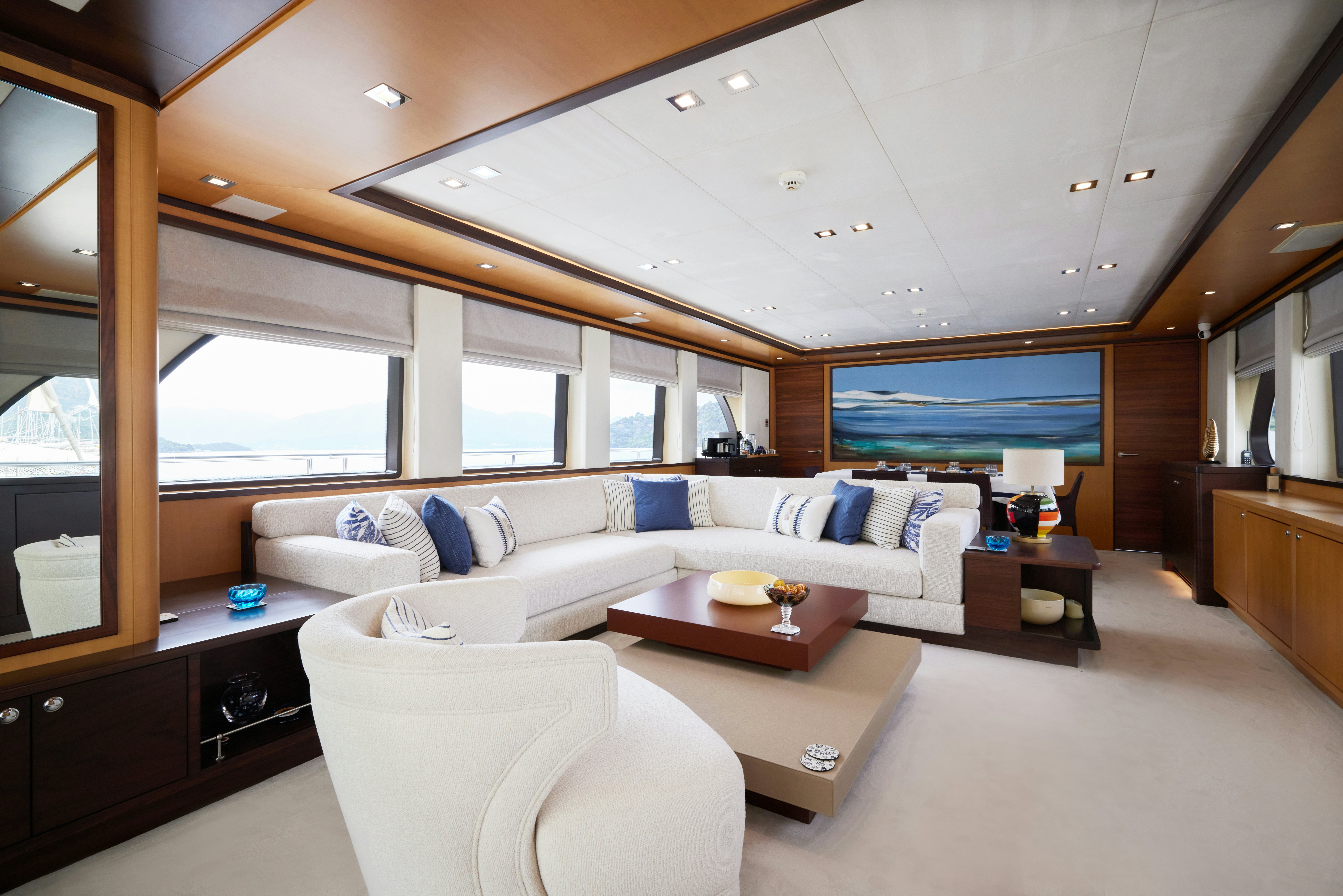 a living room with a large window aboard AYSHA Yacht for Sale