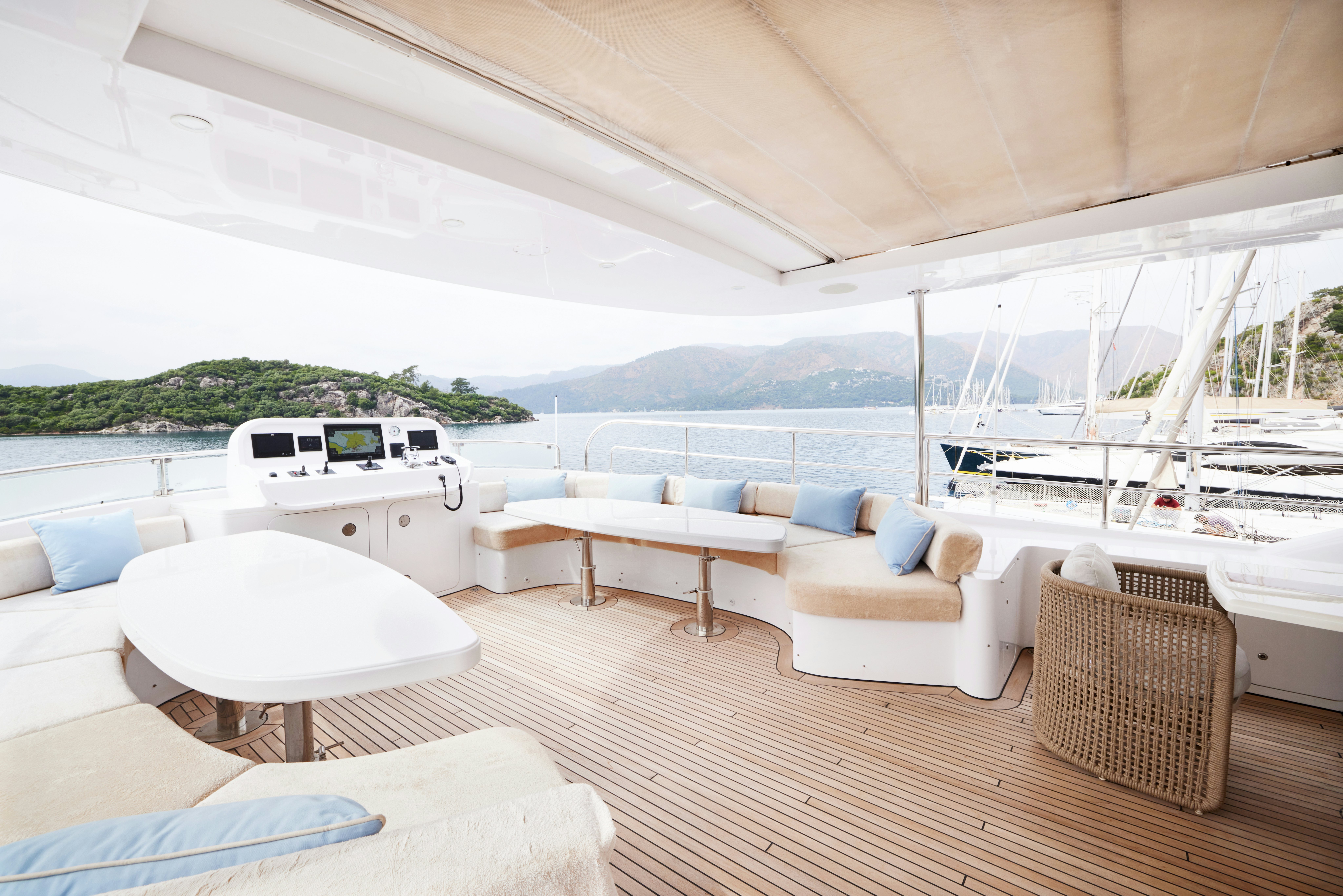 a large white tent with a couch and a table and chairs aboard AYSHA Yacht for Sale