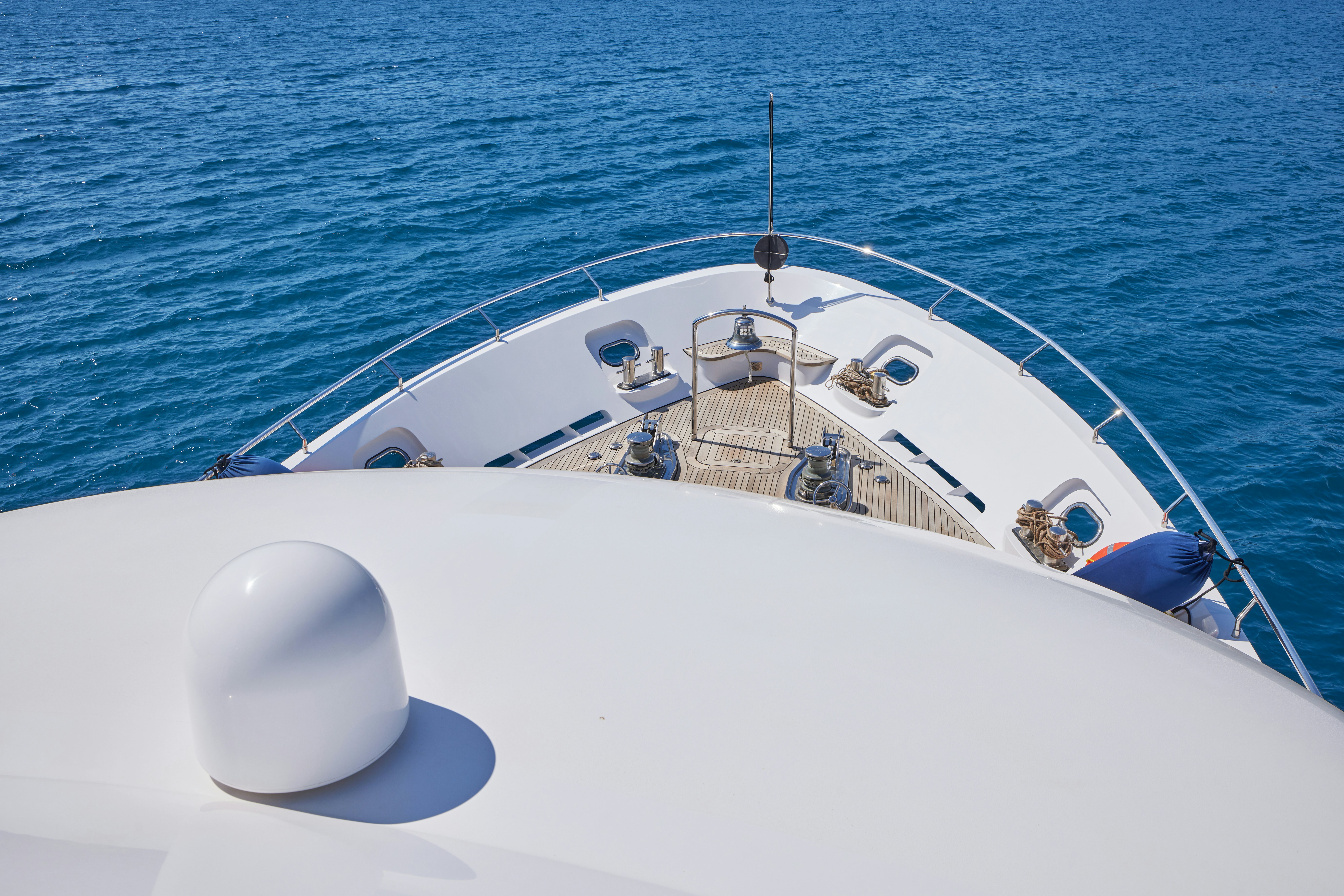 a white boat on the water aboard AYSHA Yacht for Sale