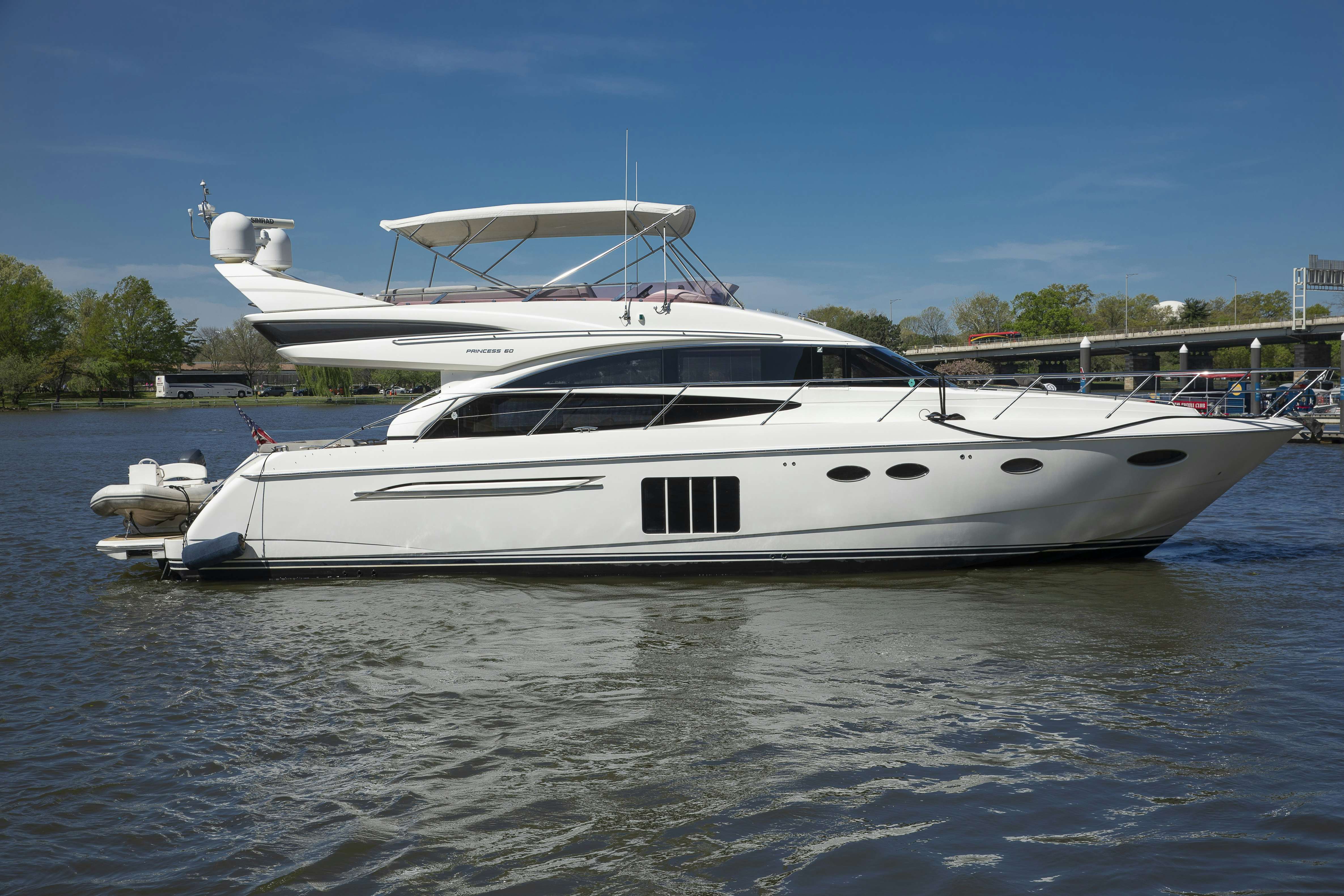 a white yacht in the water aboard PHASE ONE Yacht for Sale